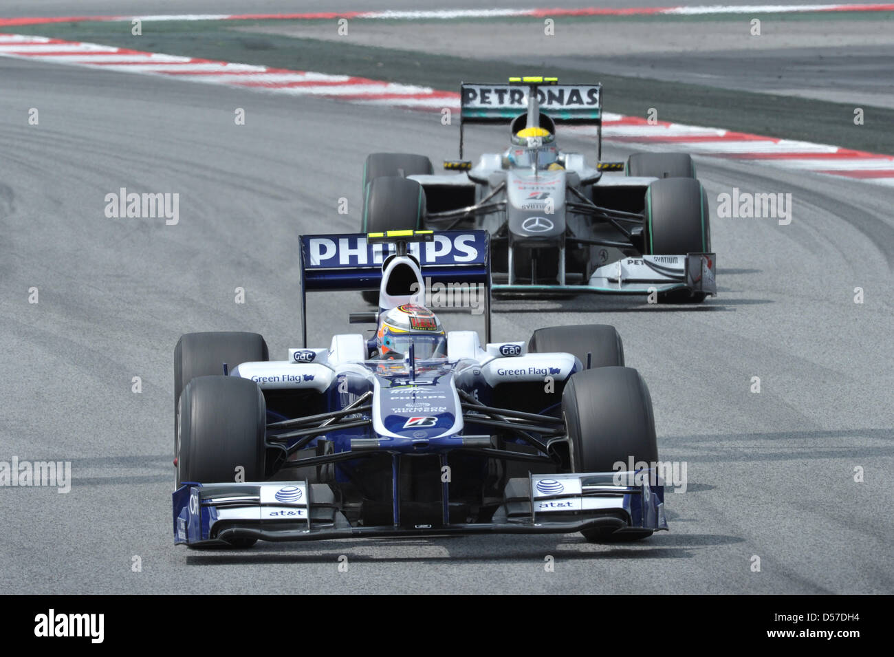 German driver Nico Huelkenberg of Williams F1 (front) defends his position against compatriot driver Nico Rosberg of Mercedes GP in the 2010 Formula 1 Grand Prix of Spain held at Circuit de Catalunya race track in Montmelo near Barcelona, Spain, 09 May 2010. Australia's Webber of Red Bull Racing won ahead of Spain's Alonso of Scuderia Ferrari and Germany's Vettel of Red Bull Racing Stock Photo