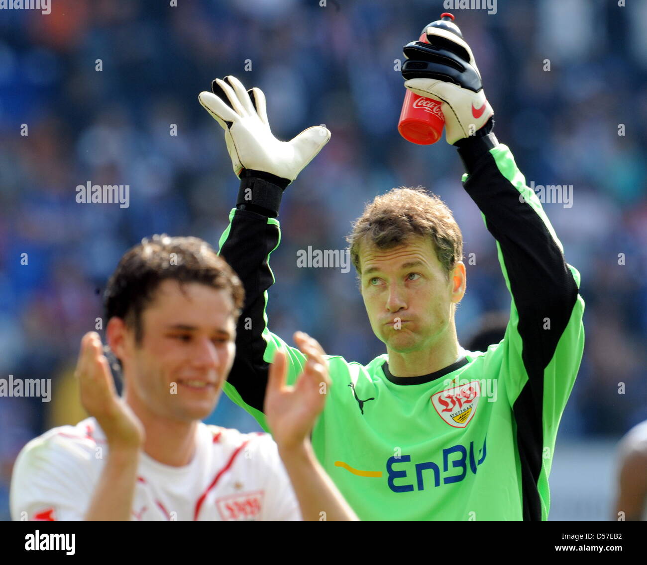 Stuttgart's Jens Lehmann (R) waves after German Bundesliga match TSG Hoffenheim vs VfB Stuttgart at Rhein-Neckar Arena in Sinsheim, Germany, 08 May 2010. He wants to end his career as a goalkeeper. On the left is Stuttgart's Christian Traesch. Photo: Bernd Weissbrod Stock Photo