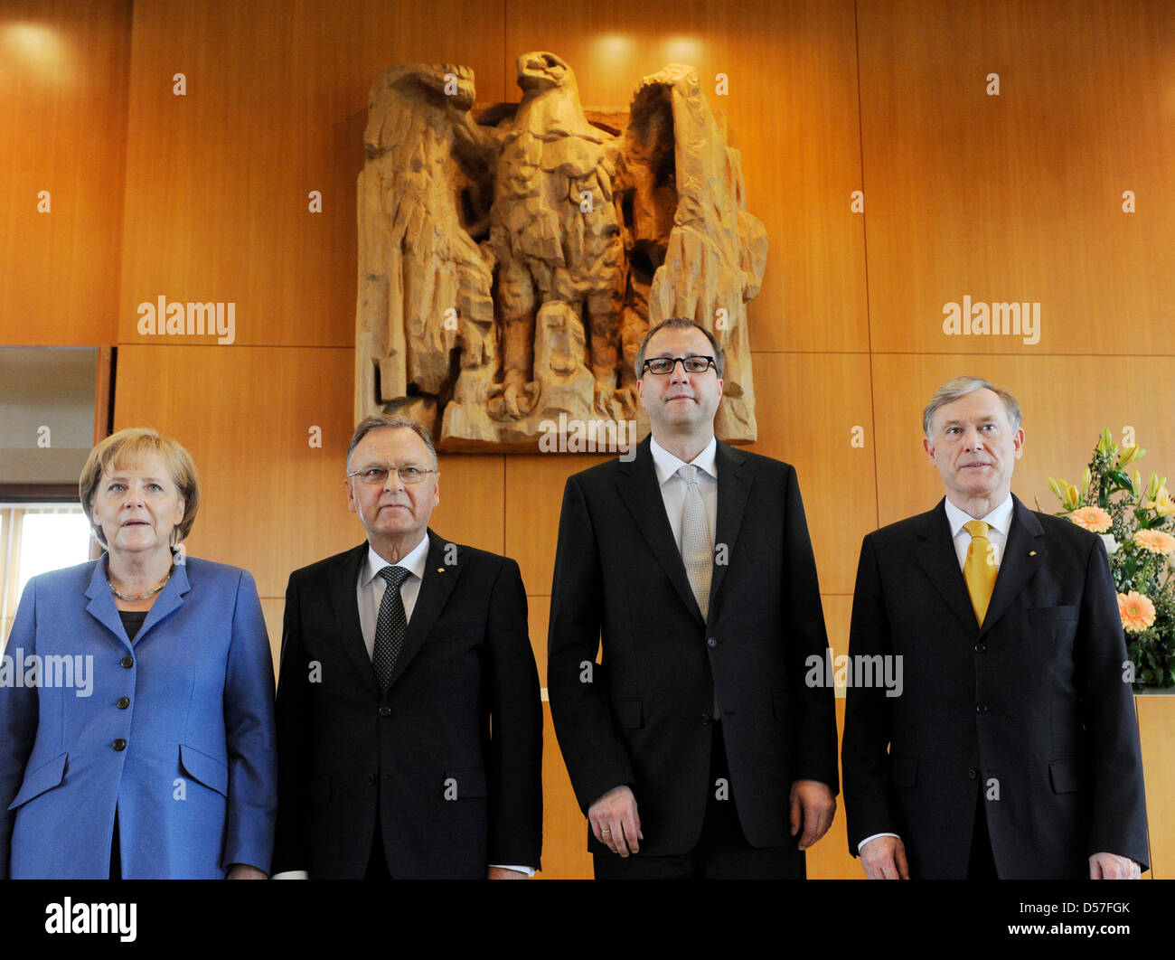 German Chancellor Angela Merkel (L-R), Hans-Juergen Papier, former President of the Federal Constitutional Court of Germany (Bundesverfassungsgericht - BVerfG), Papier's successor Andreas Vosskuhle and Horst Koehler, Federal President of Germany, stand in the Federal Constitutional Court in Karlsruhe, Germany, 14 May 2010. Vosskuhle was formally inaugurated in a ceremonial act duri Stock Photo