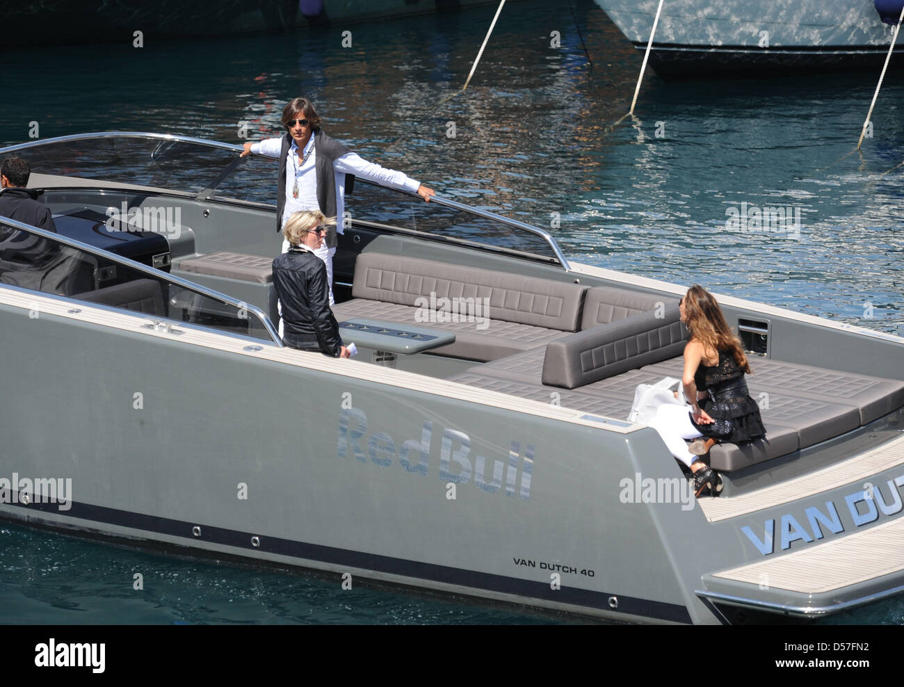 Austria's former Finance Minister, Karl-Heinz Grasser (L) and designer Fiona Swarovski (R) on a motorboat in the harbour of Monte Carlo, Monaco, 14 May 2010. Photo: Peter Steffen Stock Photo