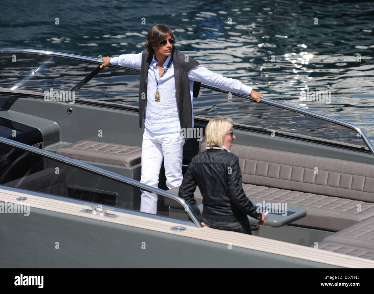 Designer Fiona Swarovski and Austria's former Finance Minister Karl-Heinz Grasser (L) on a motorboat in the harbour of Monte Carlo, Monaco, 14 May 2010. Photo: Peter Steffen Stock Photo
