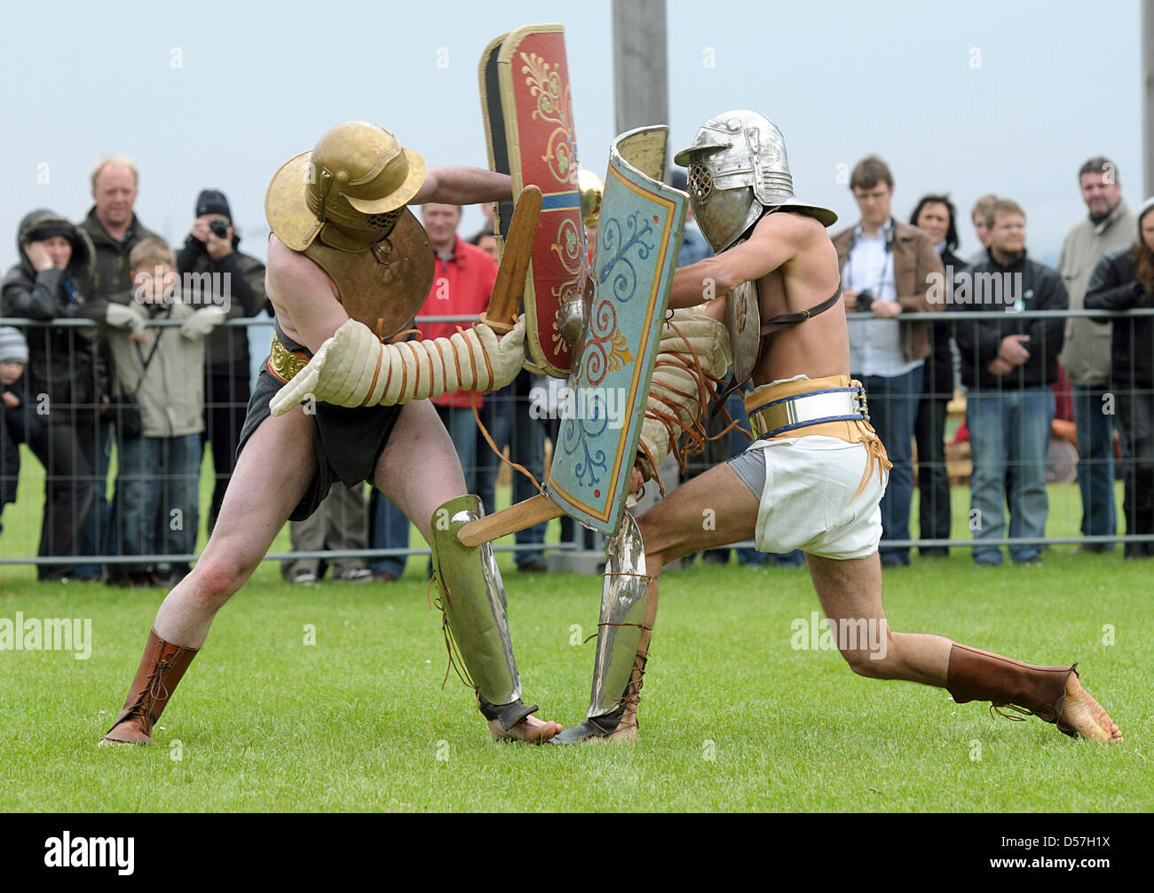 Stunt performers enact a Roman gladiator fight in Kuenzing, Germany, 16 May 2010. Within the scope of the International Museum Day, stunt perfomers demonstrated gladiator fights as they took place 2,000 years ago. Photo: ARMIN WEIGEL Stock Photo