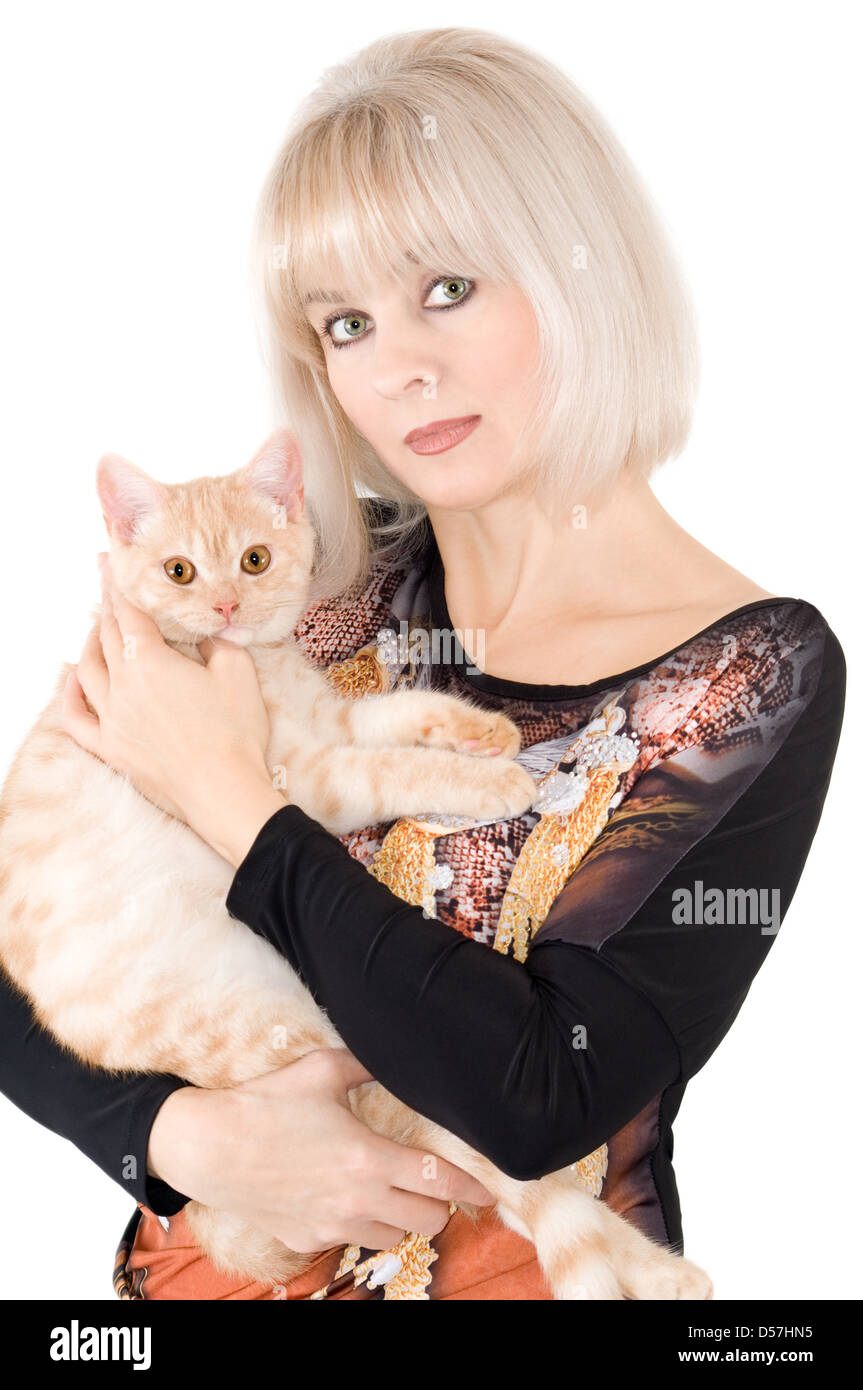 The blonde with a red cat on hands Stock Photo