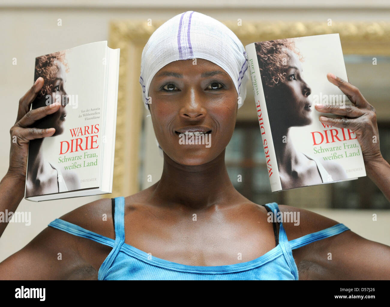 Former model Waris Dirie presents her new book 'Schwarze Frau, weißes Land' ('Black Woman, White Country') during a press conference at hotel Adlon in Berlin, Germany, 18 May 2010. In the book, Dirie talks about her life in the new, white home and her longing for Africa. Photo: JENS KALAENE Stock Photo