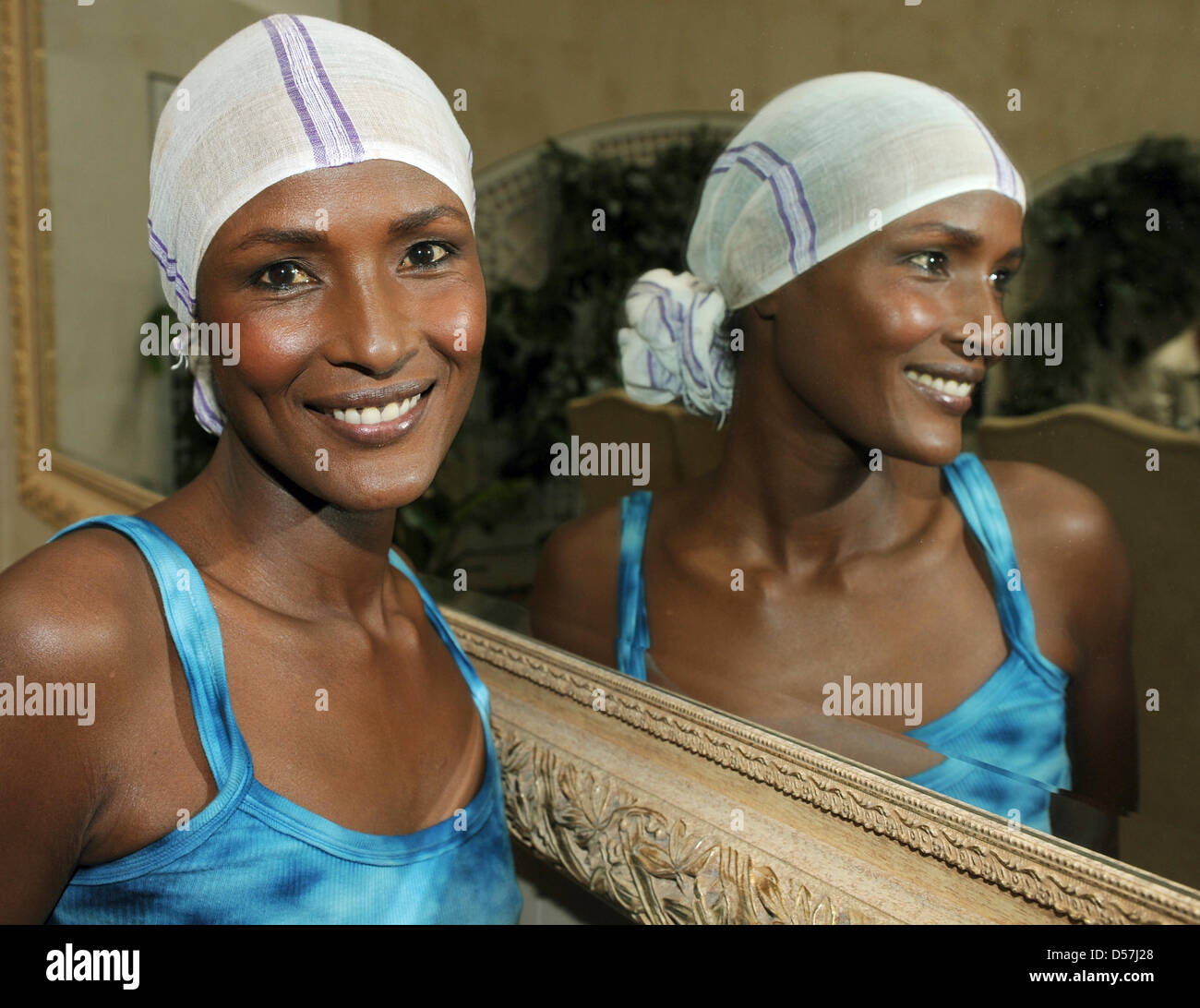 Former model Waris Dirie poses during a press conference for her new book 'Schwarze Frau, weißes Land' ('Black Woman, White Country') at hotel Adlon in Berlin, Germany, 18 May 2010. In the book, Dirie talks about her life in the new, white home and her longing for Africa. Photo: JENS KALAENE Stock Photo