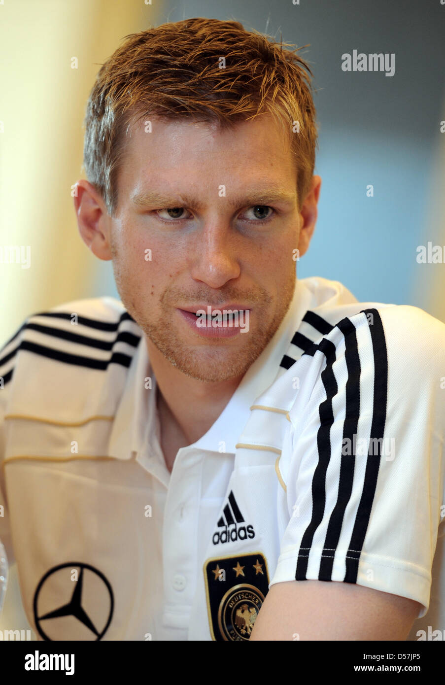 Germany international Per Mertesacker poses for a photo during the