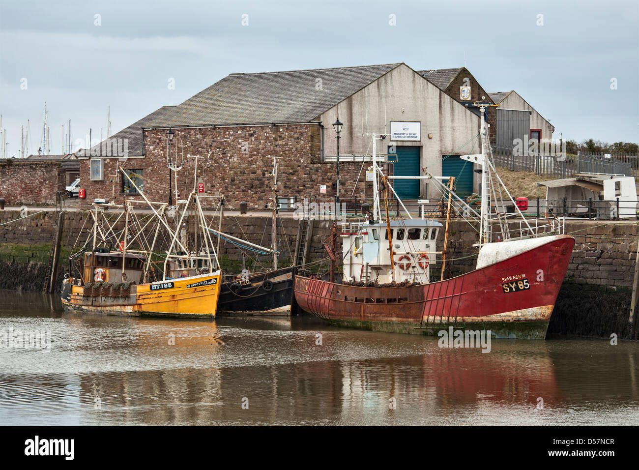 Fishing boats anchored at Maryport, Cumbria. Stock Photo