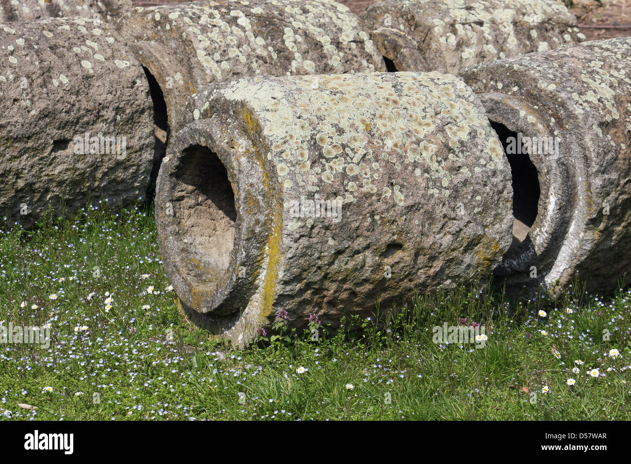stone and trachyte tubes of an ancient Roman aqueduct historical artifact Stock Photo