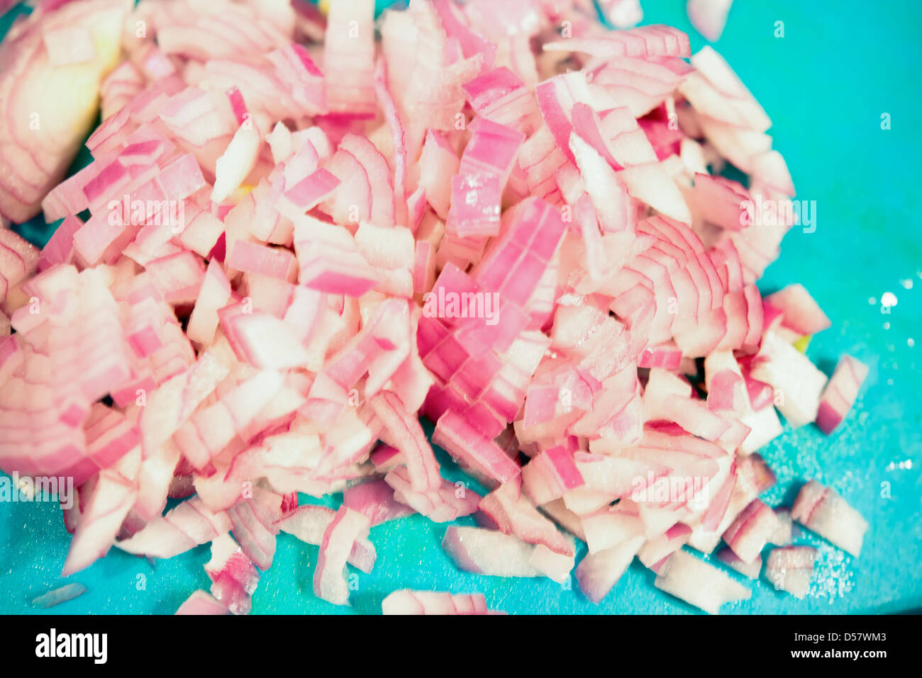 sOME chopped red onions on chopping board Stock Photo - Alamy