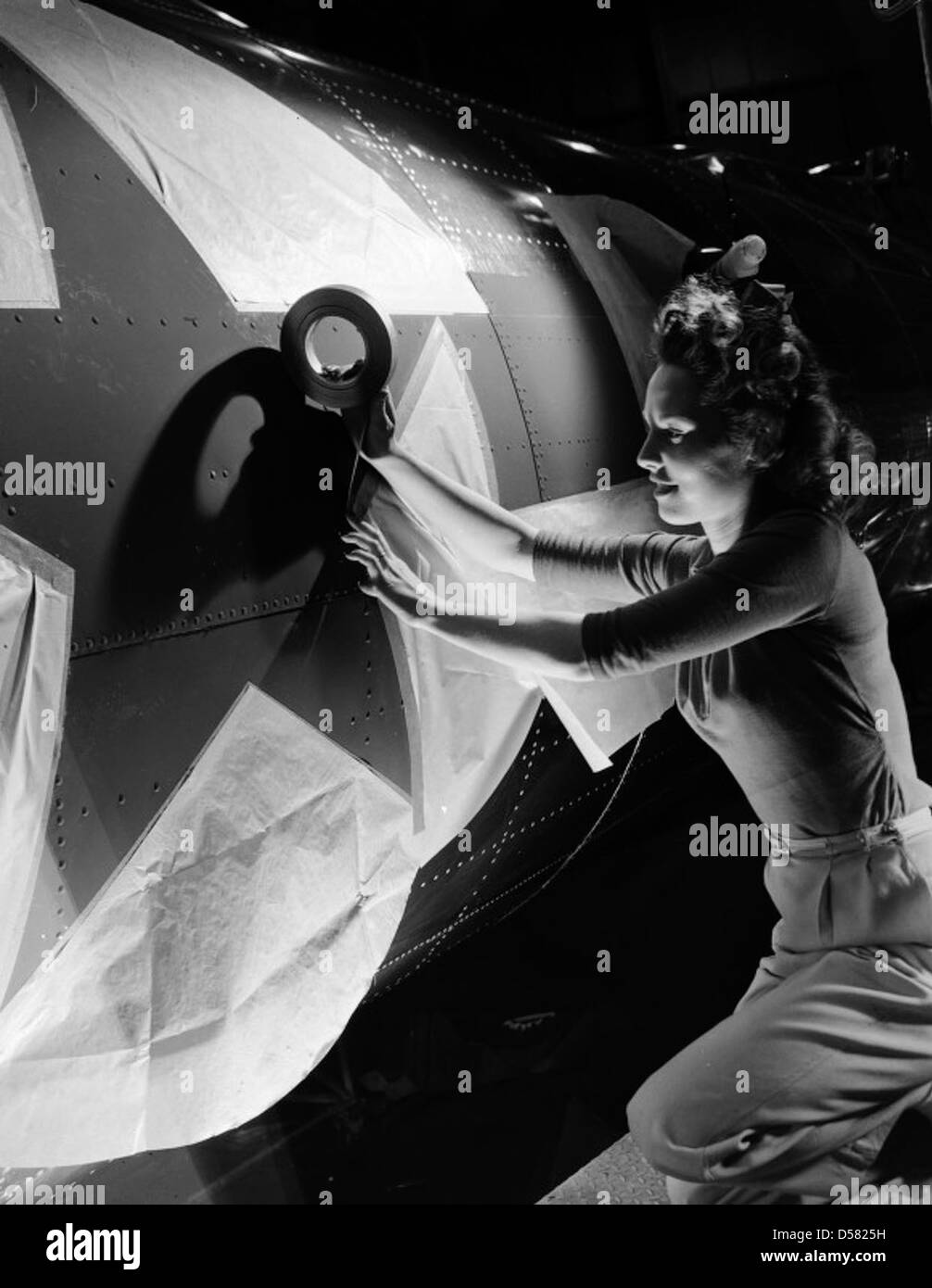 [Woman working, Industrial Tape, Boeing] Stock Photo