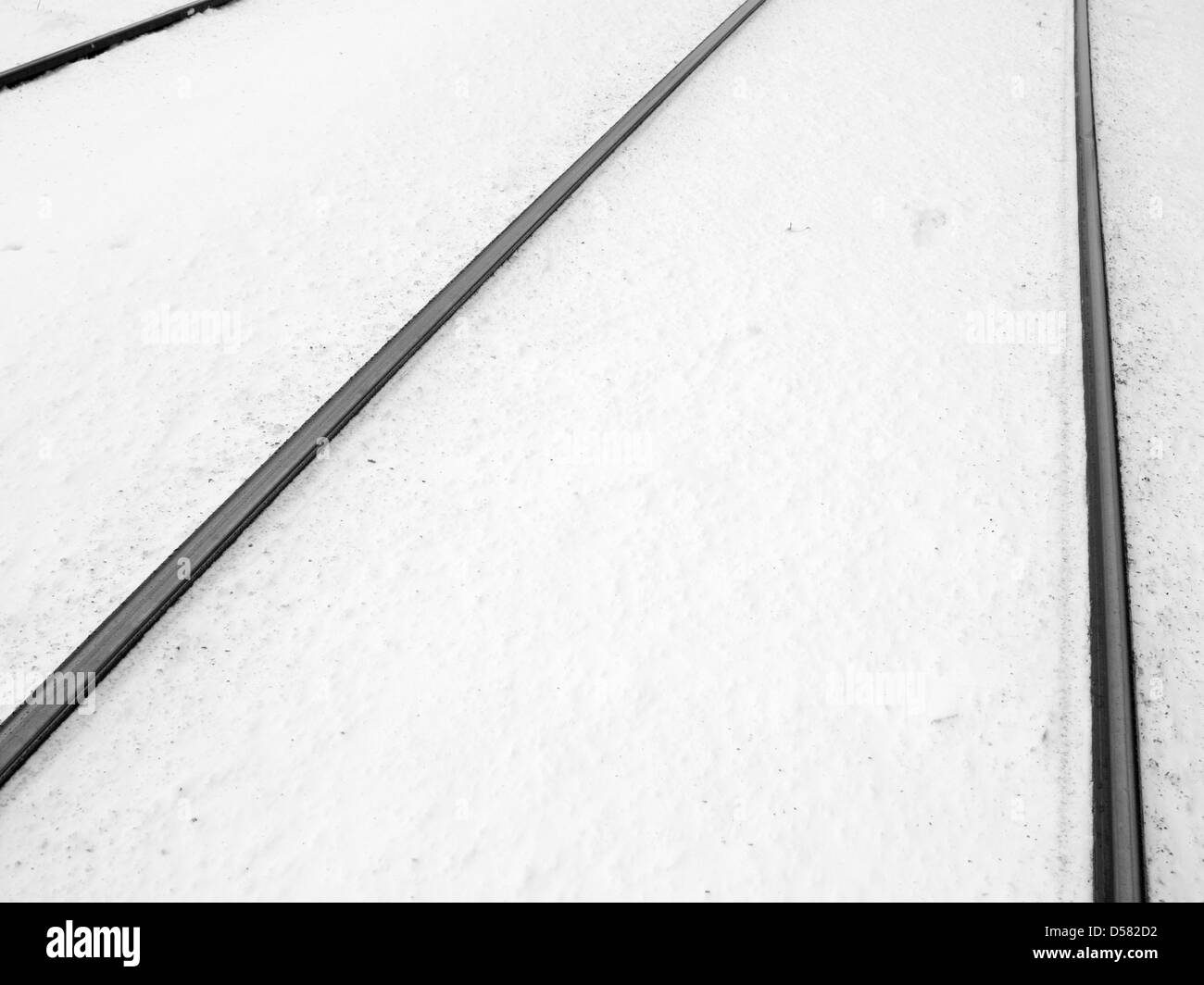 Rails in the snow Stock Photo - Alamy