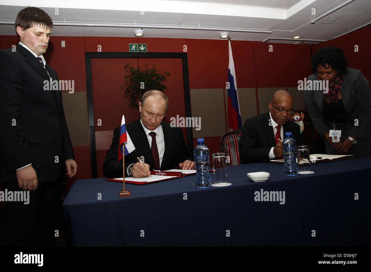 Durban, South Africa, USA. 26th March, 2013. Russian president Vladimeir Putin and South African President Jacob Zuma sign the Durban Declaration for Strategic Partnership - a cooperation agreement that aims to cement diplomatic relations between the two countries. The two signed the declaration ahead of the Fith Brics Summit beinbg held in the city. Picture: Giordano Stolley/Alamy Live News Stock Photo
