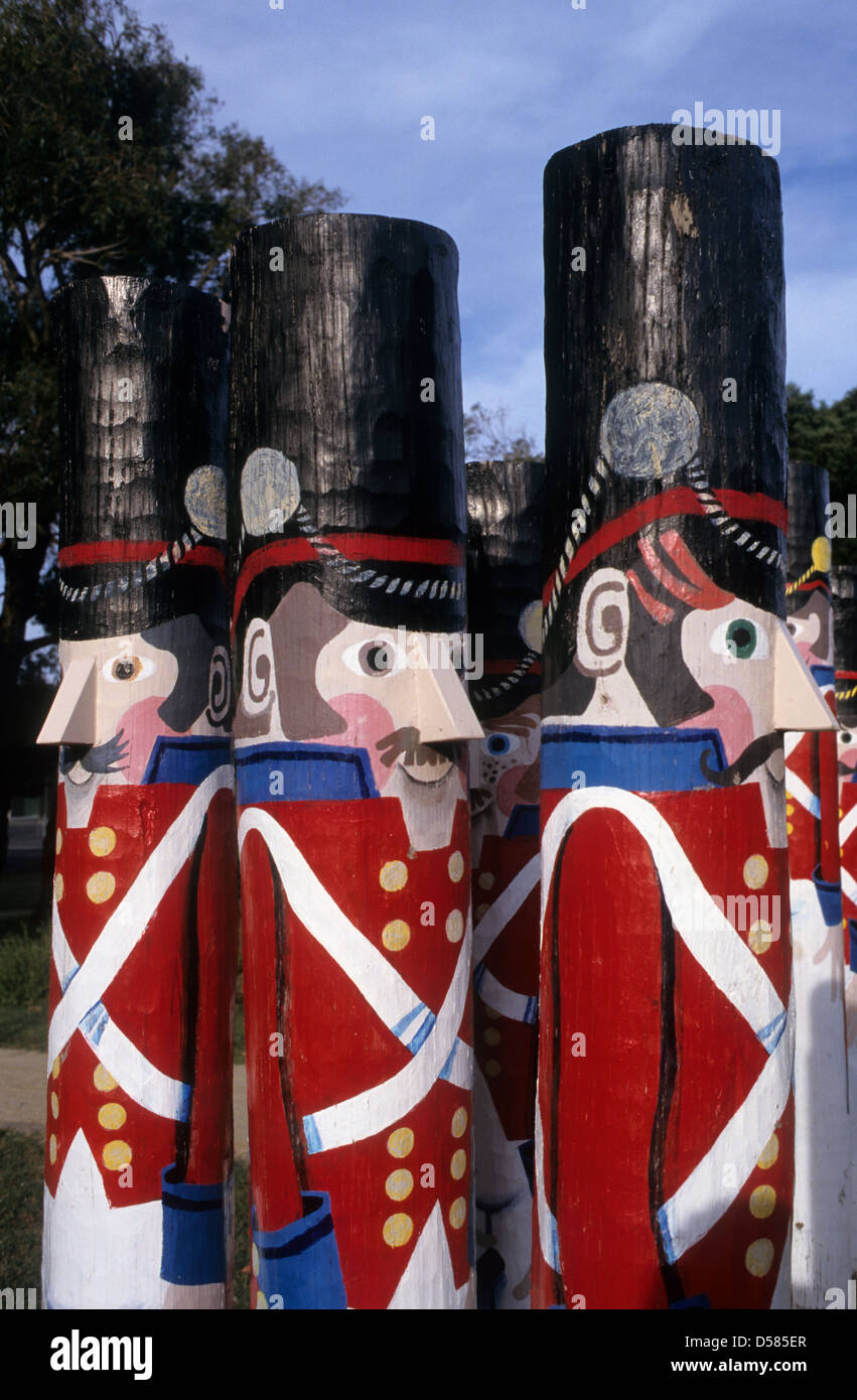Australia, Victoria, Barwon Heads,  wooden bollards painted by a local artist, Jan Mitchell to help children cross the road. Stock Photo