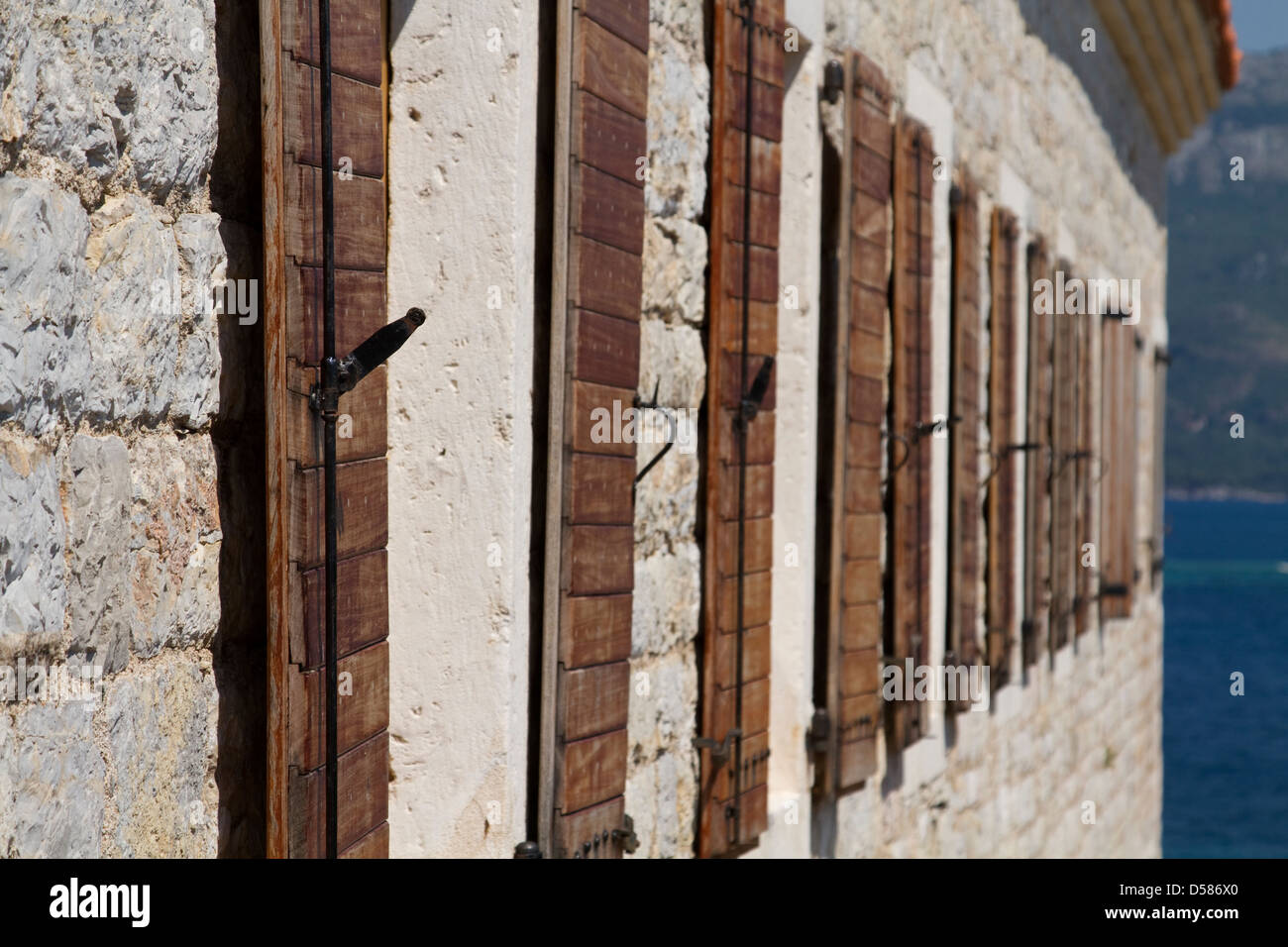 Window shutters on a building in Budva old town, Montenegro Stock Photo