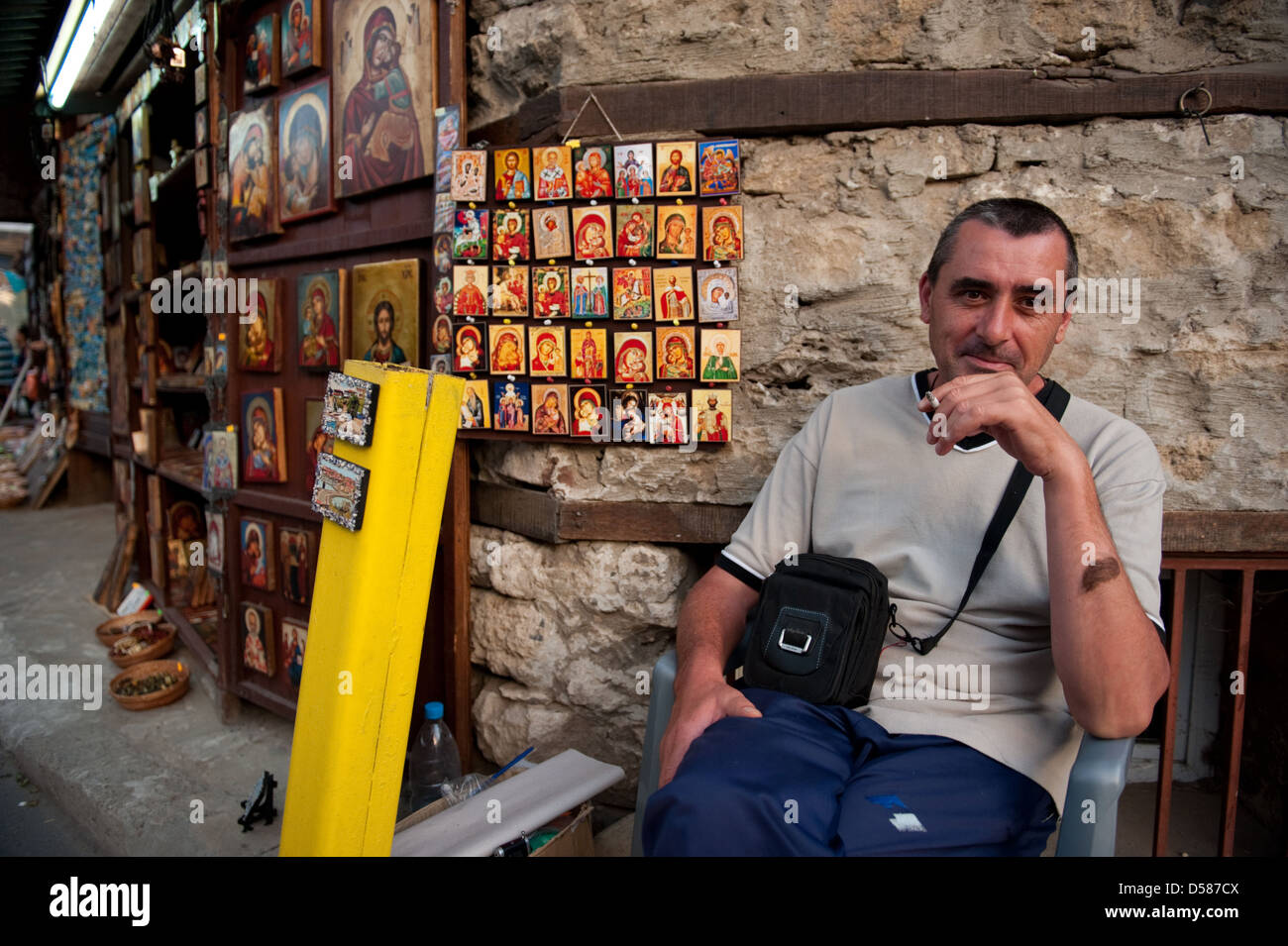 Nessebar, Bulgaria, seller waits in the Old Town on customers Stock Photo