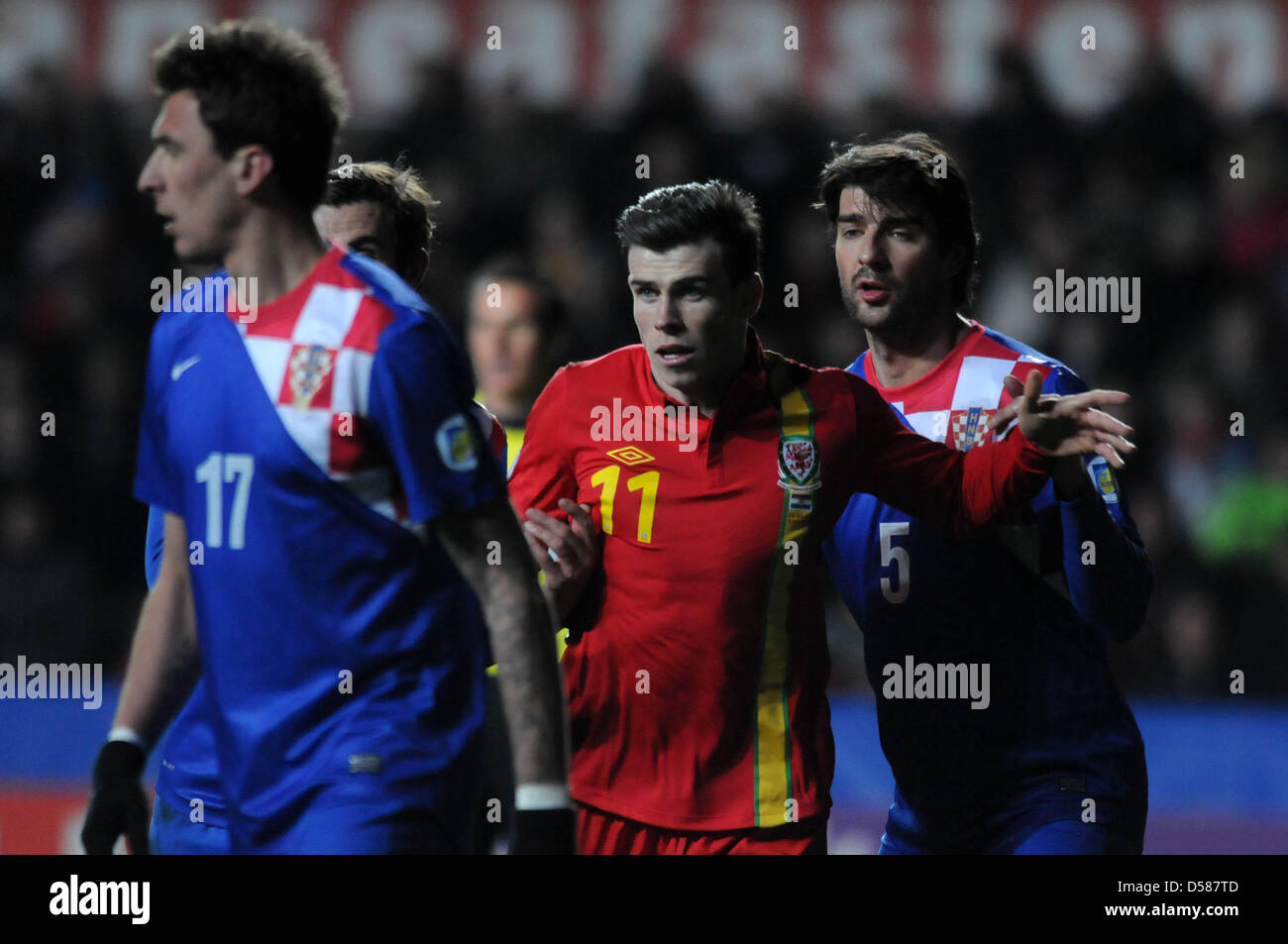 FIFA 2014 World Cup Qualifier - Wales v Croatia - Swansea - 26th March 2013 : Gareth Bale of Wales alongside Vedran Corluka of Croatia (5). Stock Photo