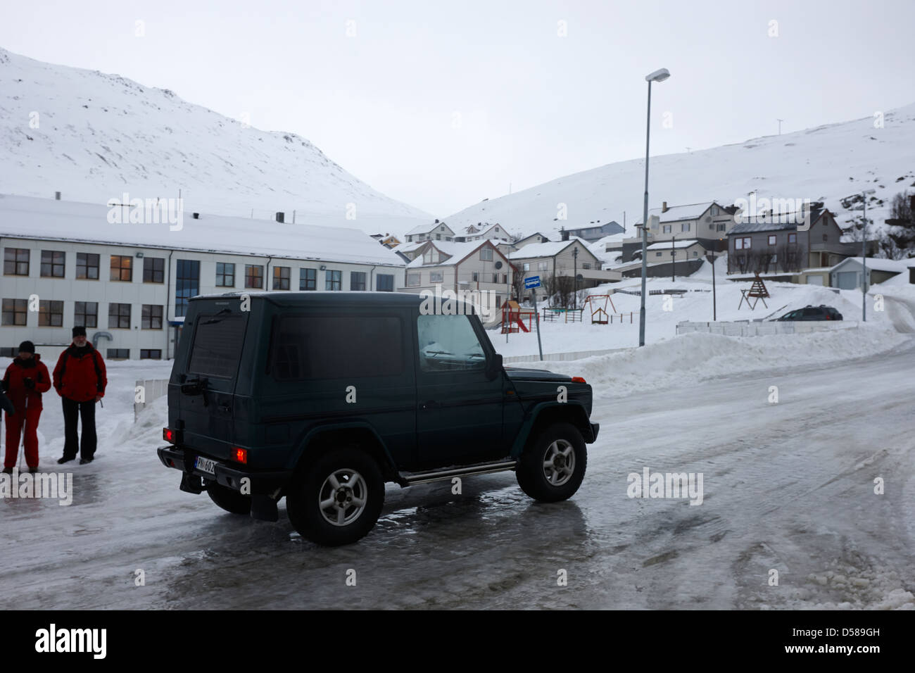 mercedes g-wagen 4x4 climbing icy street in Honningsvag finnmark norway europe Stock Photo
