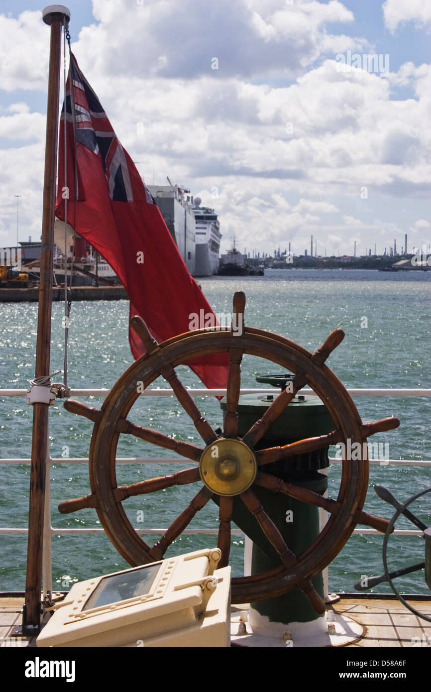 Steam ship view of steering wheel and union jack flag Stock Photo Alamy