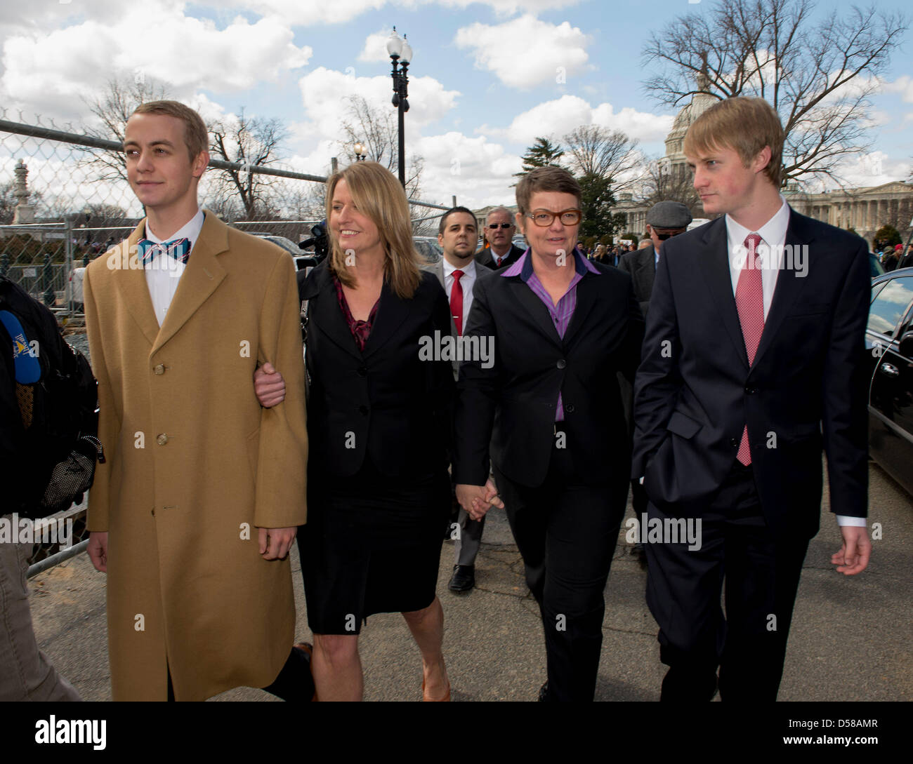 March 26, 2013 - Washington, District of Columbia, U.S. - Plaintiffs SANDY STIER (left) and KRIS PERRY leave the U.S. Supreme Court with their sons SPENCER PERRY (left) and ELLIOTT PERRY after oral arguments in the landmark Proposition 8 marriage equality case.(Credit Image: © Brian Cahn/ZUMAPRESS.com) Stock Photo