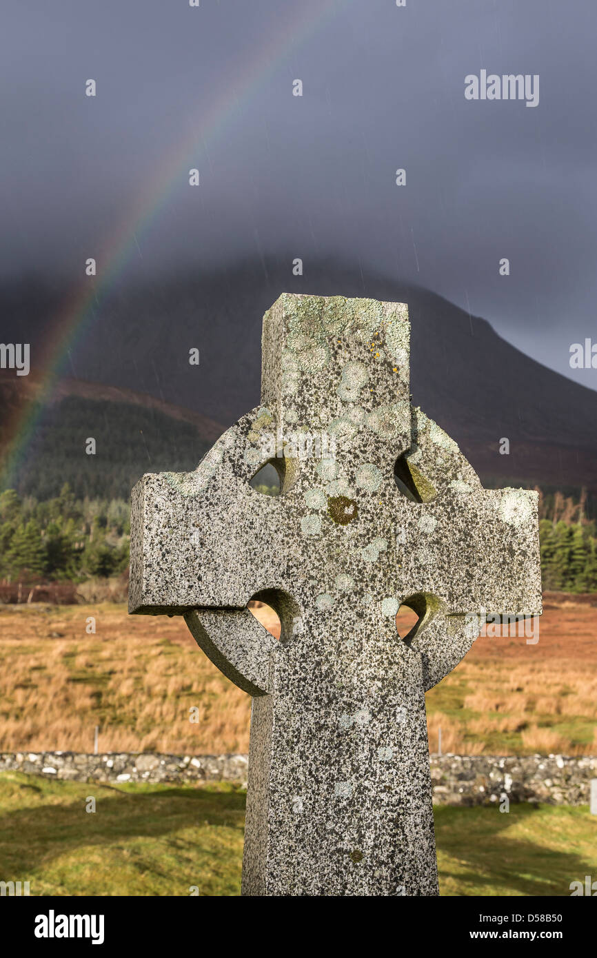 Celtic Cross and Beinn na Caillach at Cill Chriosd on the Isle of Skye in Scotland. Stock Photo
