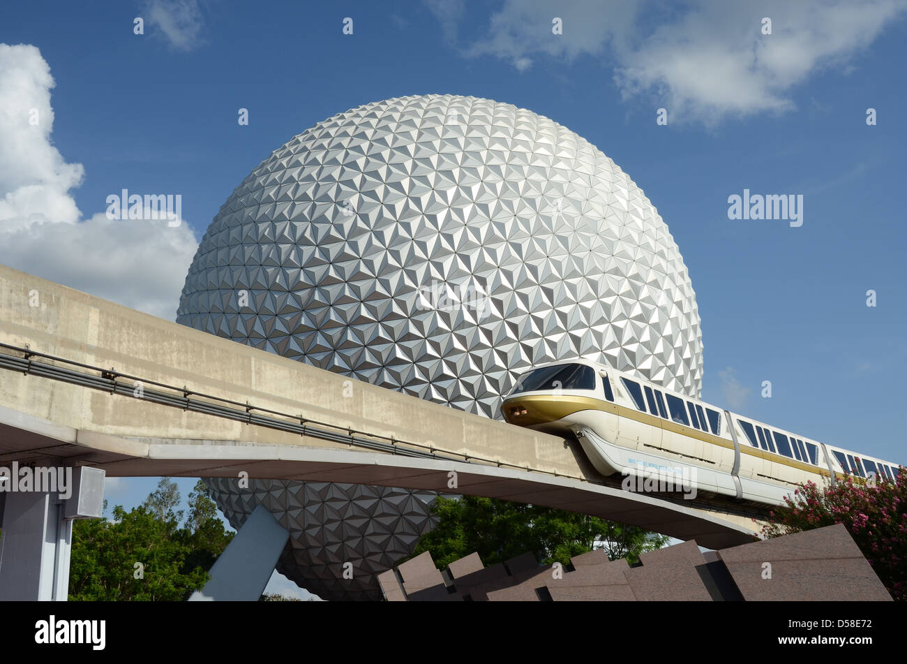 Disney's Monorail passes Spaceship Earth the Icon of Epcot at Epcot ...