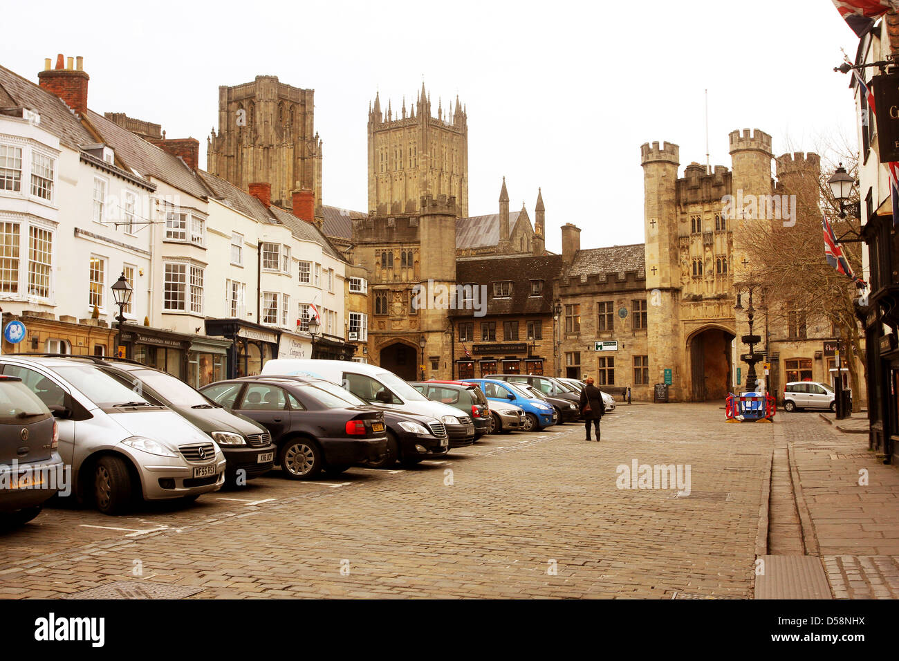 Cars parked in the market square in Wells, Somerset, England, UK. March
