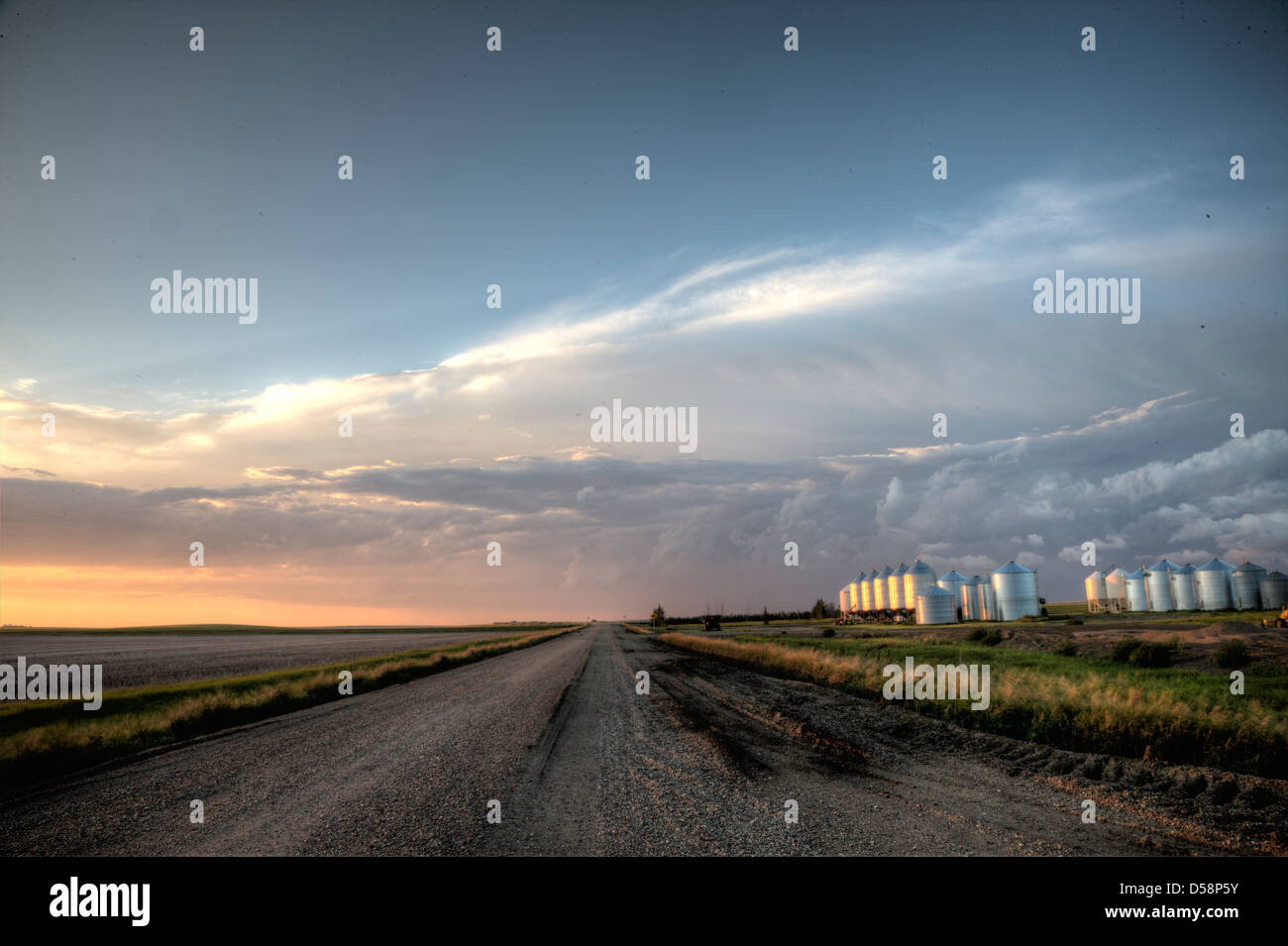 Storm Clouds Saskatchewan billowing clouds and gravel road Stock Photo ...