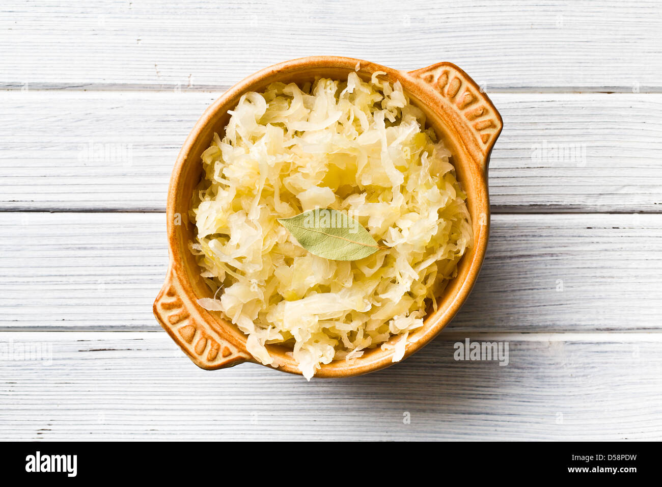 the sauerkraut in ceramic bowl Stock Photo
