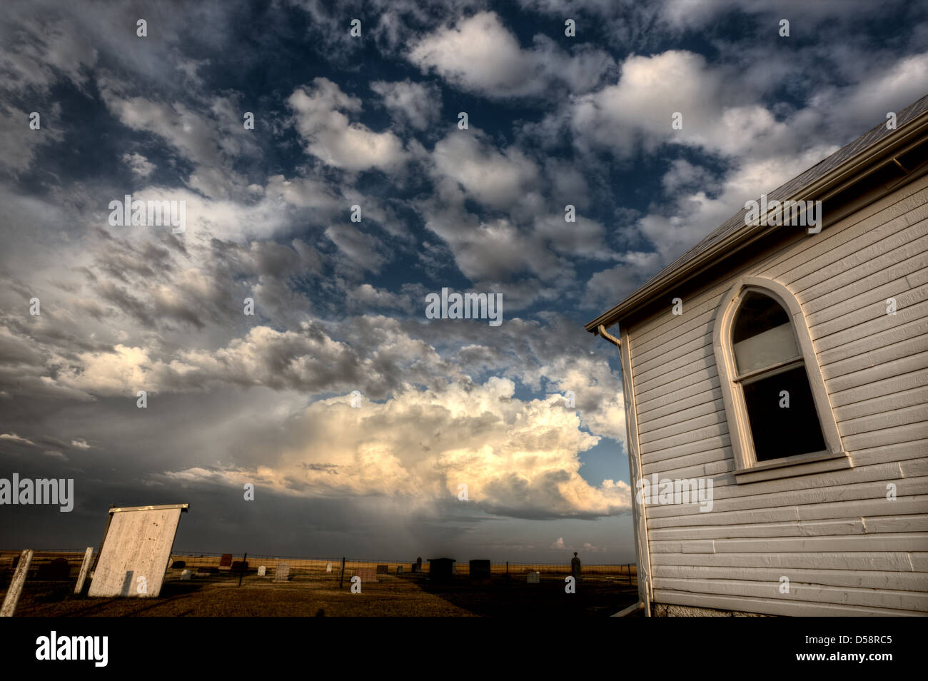 Storm Clouds Saskatchewan with country church at sunset Stock Photo - Alamy