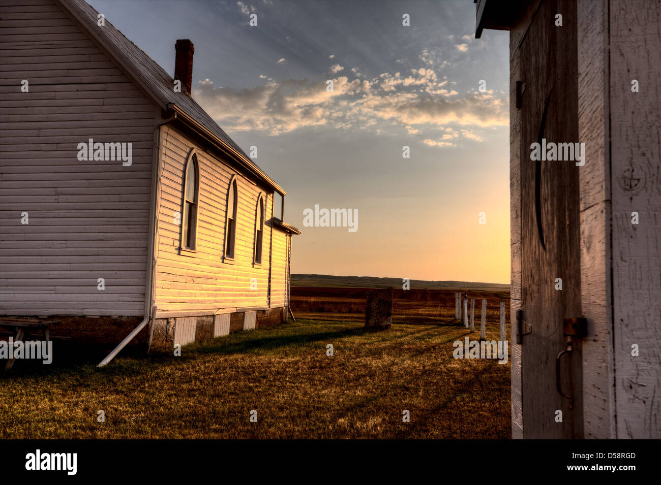 Storm Clouds Saskatchewan with country church at sunset Stock Photo - Alamy