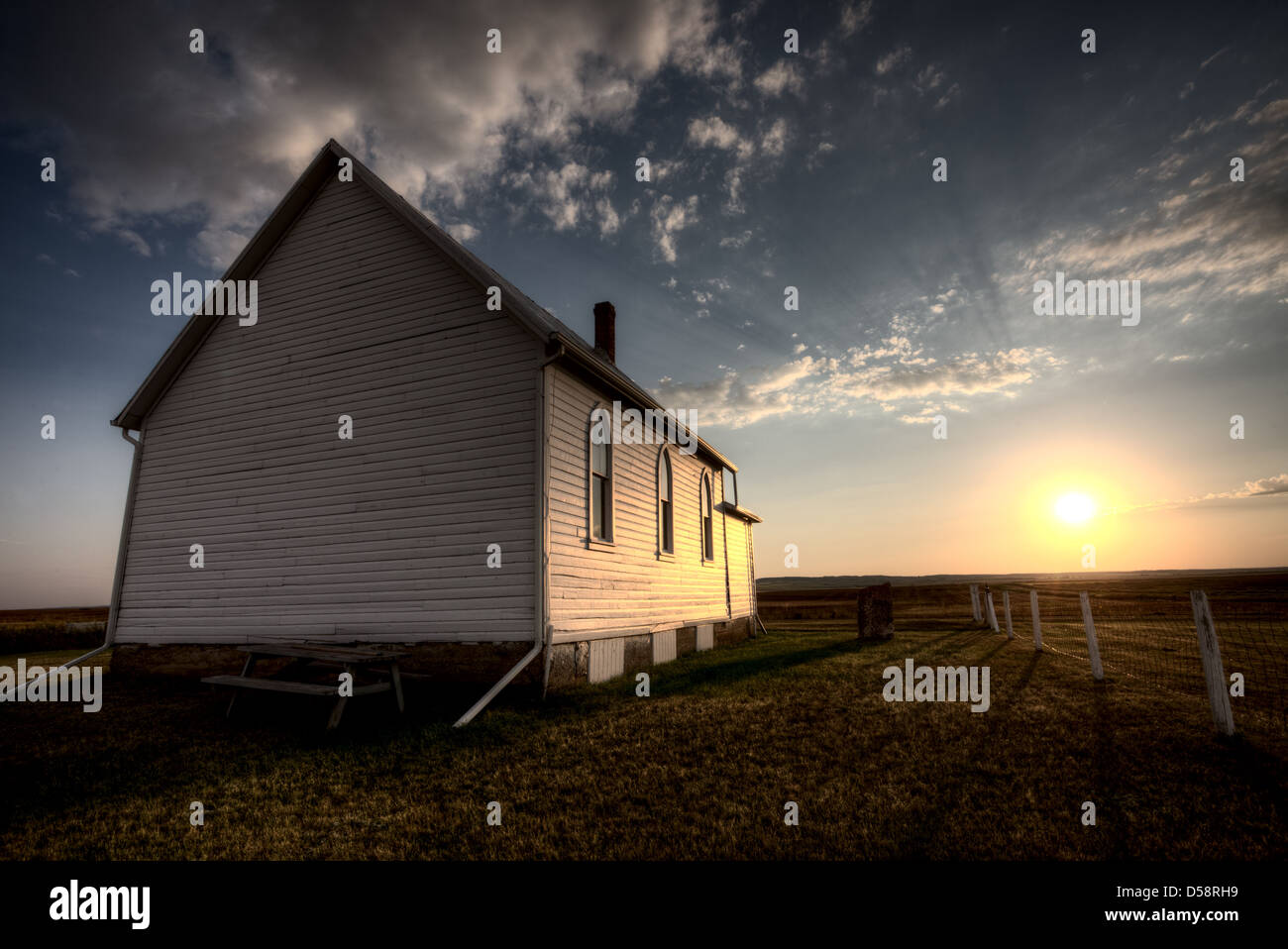 Storm Clouds Saskatchewan with country church at sunset Stock Photo - Alamy