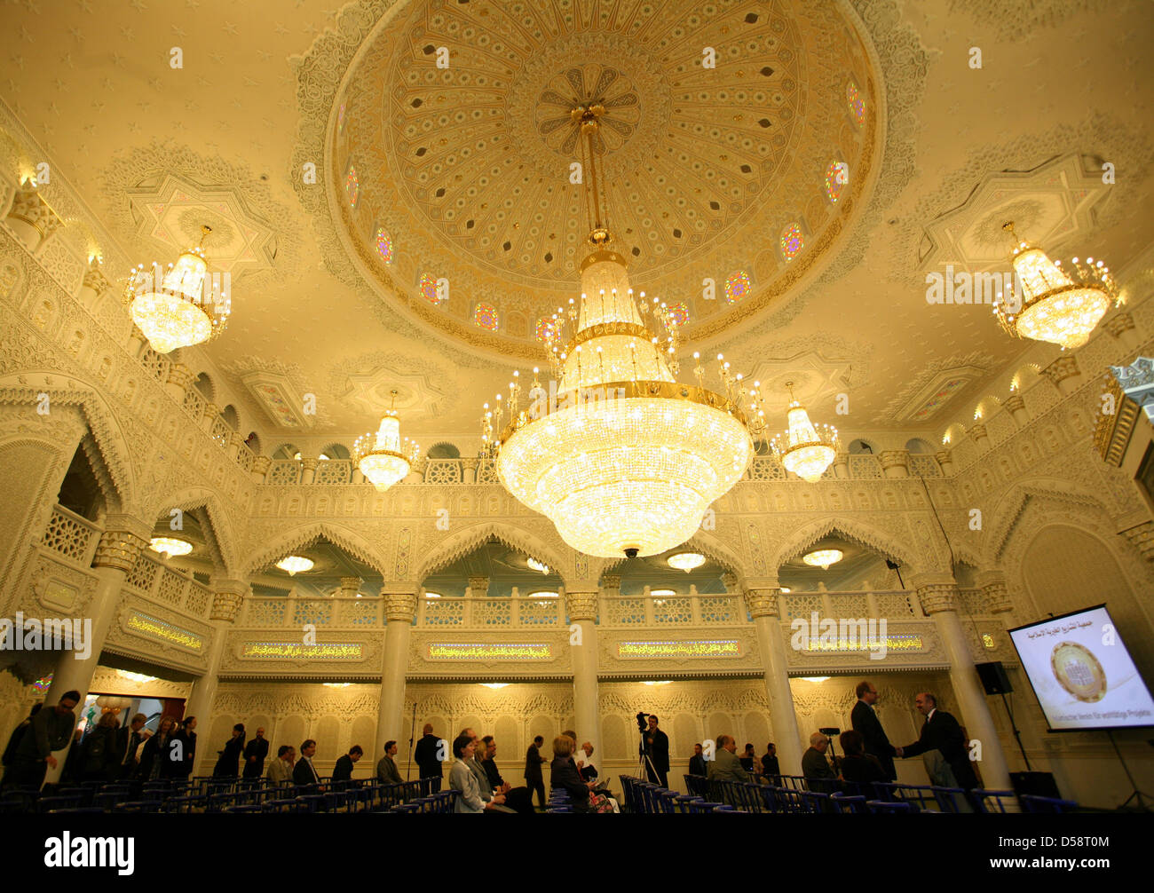 Visitors arrive for the opening ceremony of the new Omar-Ibn-Al-Khattar mosque in Berlin, Germany, 21 May 2010. Bedies the mosque, business and seminar rooms are situated in the newly built Maschari Center. The exuberantly decorated mosque accomodates 1000 believers. According to public authoritites, 300 000 Muslims live in Berlin; about 80 mosques are available for them. Photo: ST Stock Photo