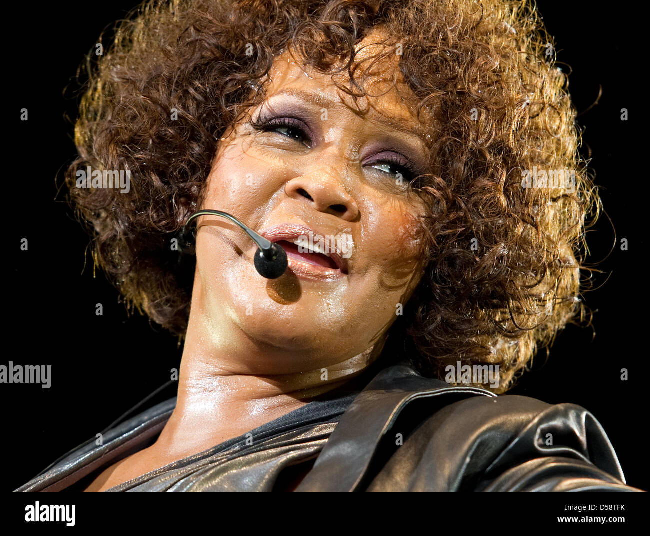 US singer Whitney Houston performs during a concert at Stock Photo