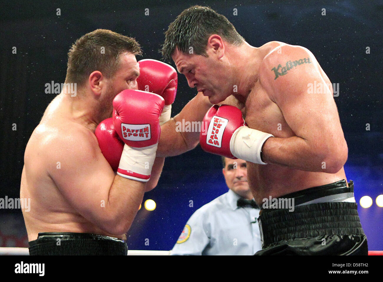 Uzbek boxer Ruslan Chagaev (L) fights Australian boxer Kali Meehan at