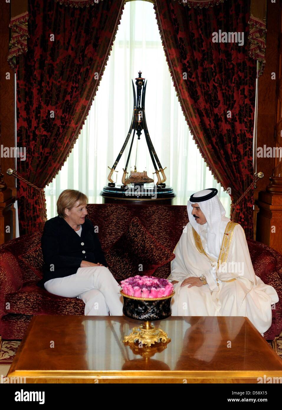 Bahrain's Prime Minister Khalifa ibn Sulman al Khalifa (R) welcomes ...