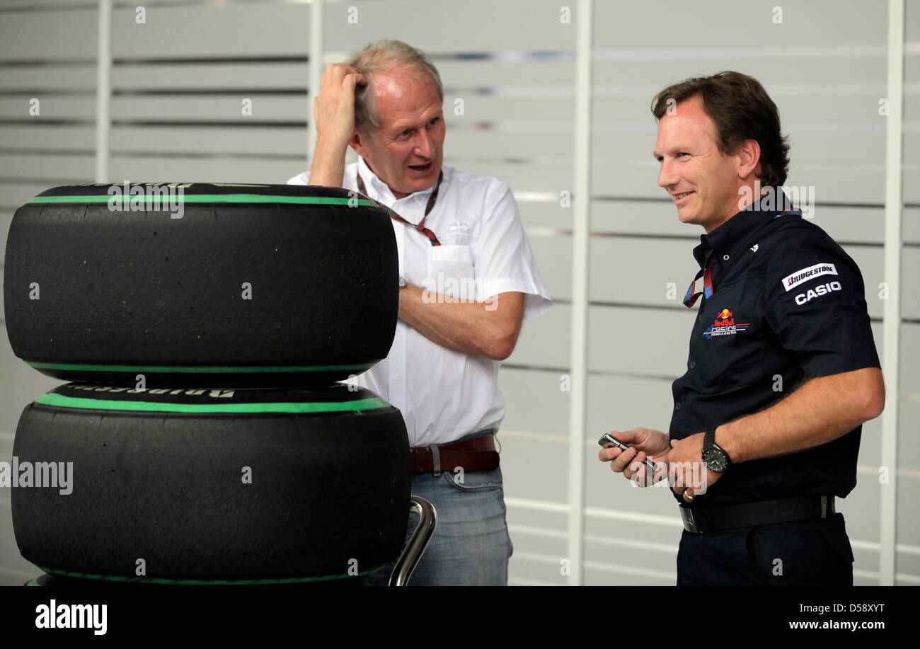 Christian Horner, principal of Red Bull Racing (R), talks to Helmut Marko, Red Bull motorsports director, during the qualifying for the Formula One Grand Prix at Istanbul Park circuit in Istanbul, Turkey, 29 May 2010. The Grand Prix of Turkey will be held on 30 May 2010. Photo: JAN WOITAS Stock Photo
