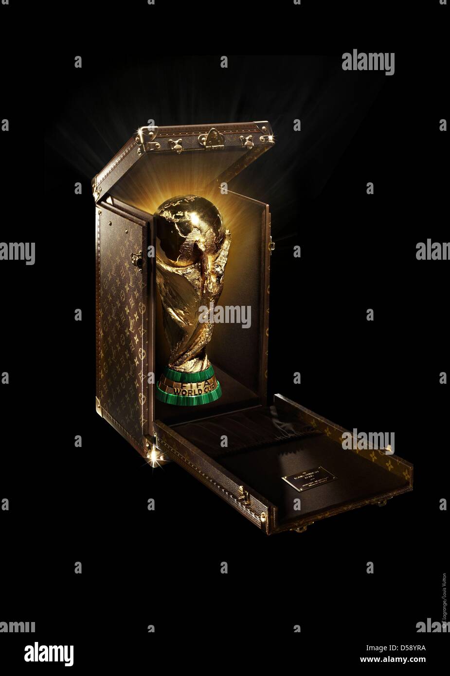 The undated handout picture shows a special Louis Vuitton suit case for the FIFA World Cup trophy in Paris, France. The trophy will be carried to South Africa in the special suit case. Photo: Thomas Lagrange / LOUIS VUITTON (ATTENTION: HANDOUT - Editorial usage only) Stock Photo