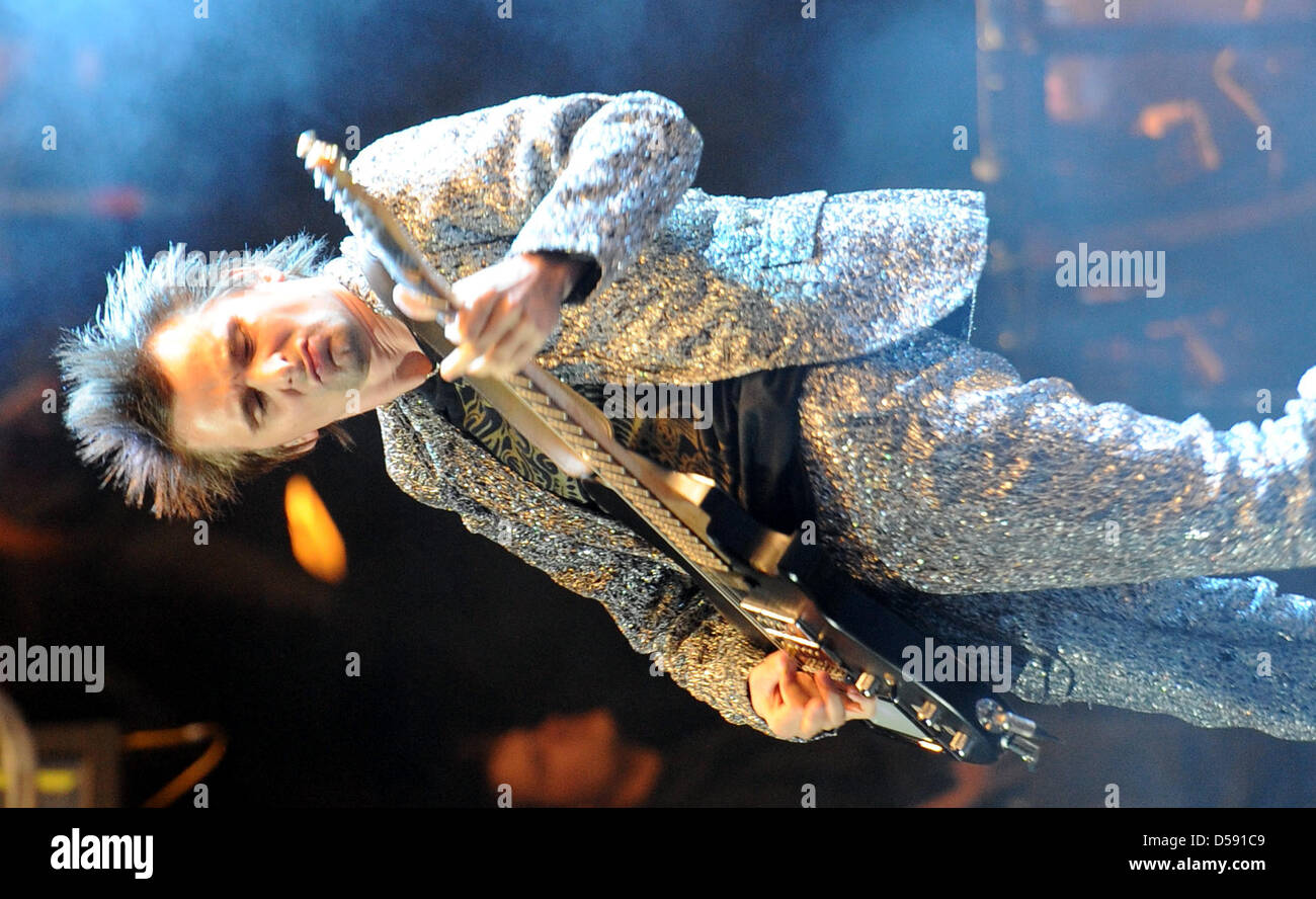 British stadium rock band Muse performs with lead singer Matthew Bellamy  perform at Rock am Ring festival at Nurburgring in Nuerburg, Germany, 05  June 2010. The four-day festival sold out with 85,000