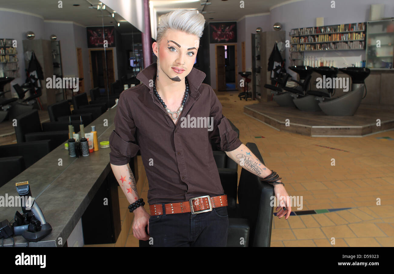 Hairdresser Sebastian Boehm poses in his hair salon 'Rocksthaar' in the  Hundertwasser building in Magdeburg, Germany, 03 June 2010. The flamboyant  personality is responsible for the hairdo of 'Tokio Hotel' singer Bill