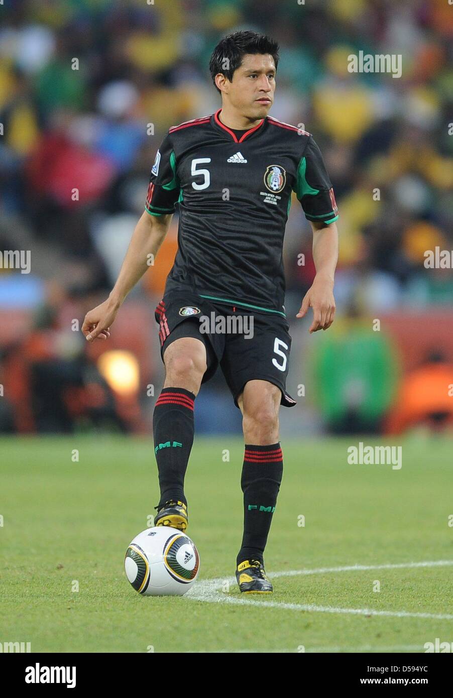 Mexico's Ricardo Osorio controls the ball during the opening match between South Africa and Mexico at the 2010 FIFA World Cup at Soccer City stadium in Johannesburg, South Africa 11 June 2010. Photo: Achim Scheidemann dpa - Please refer to http://dpaq.de/FIFA-WM2010-TC Stock Photo