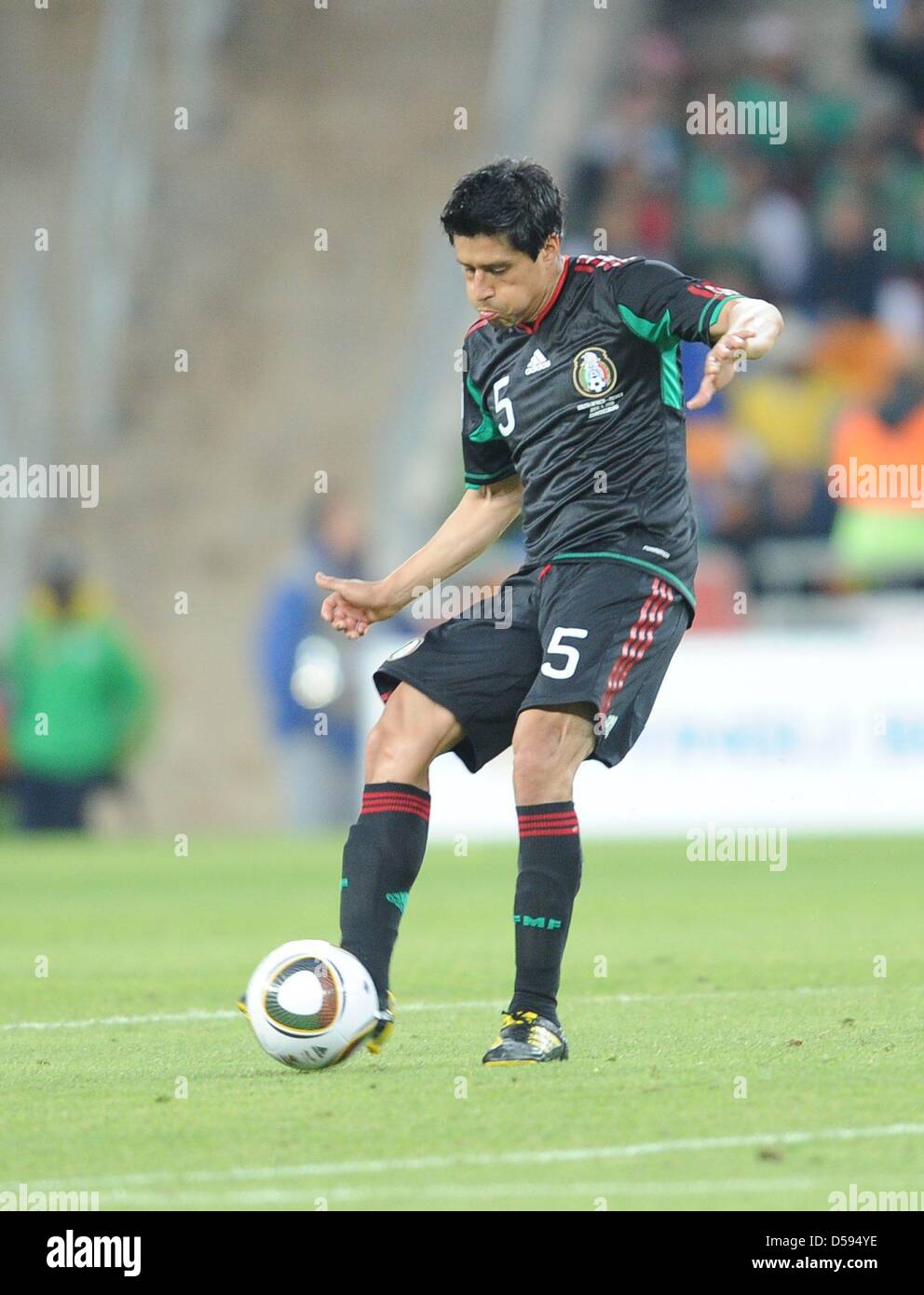 Mexico's Ricardo Osorio controls the ball during the opening match between South Africa and Mexico at the 2010 FIFA World Cup at Soccer City stadium in Johannesburg, South Africa 11 June 2010. Photo: Achim Scheidemann dpa - Please refer to http://dpaq.de/FIFA-WM2010-TC Stock Photo