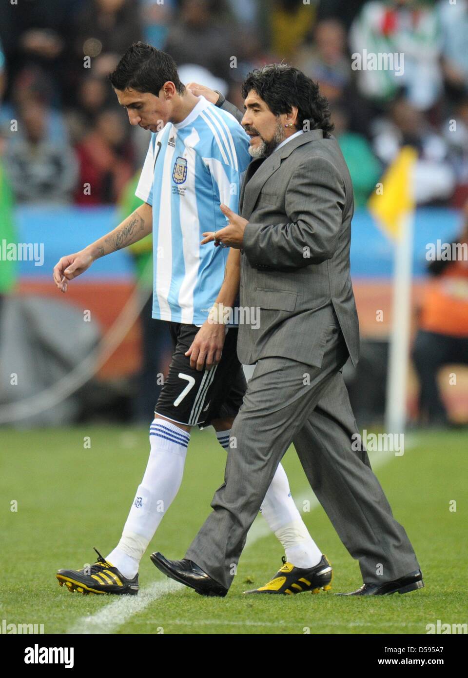 Head coach Diego Armando Maradona (R) speaks to Angel di Maria during the  FIFA World Cup group B soccer match between Argentina and Nigeria at Ellis  Park Stadium in Johannesburg, South Africa