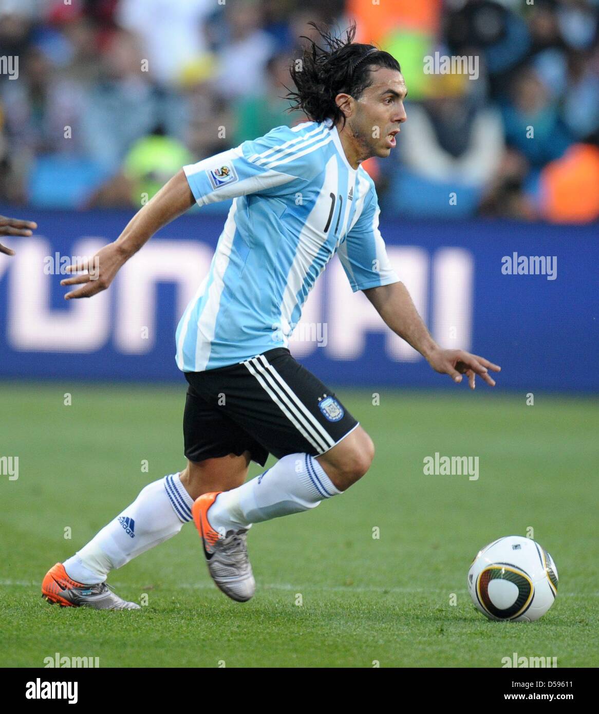 Carlos Tevez of Argentina controls the ball during the FIFA World