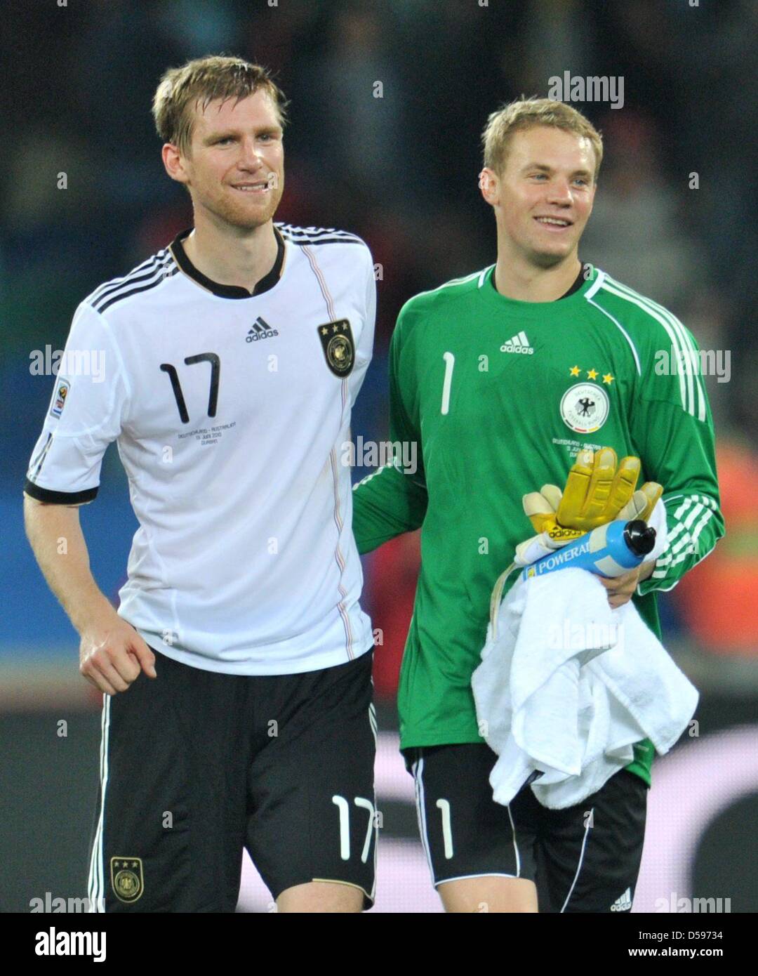 Per Mertesacker (L) and goalkeeper Manuel Neuer of Germany celebrate