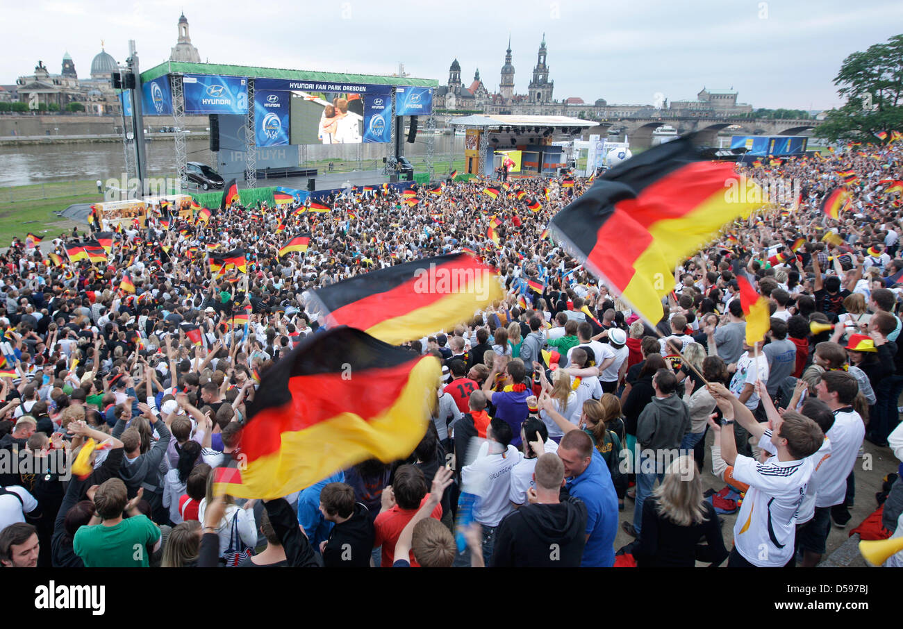 Fans cheer the German team as they attend a public broadcast of the