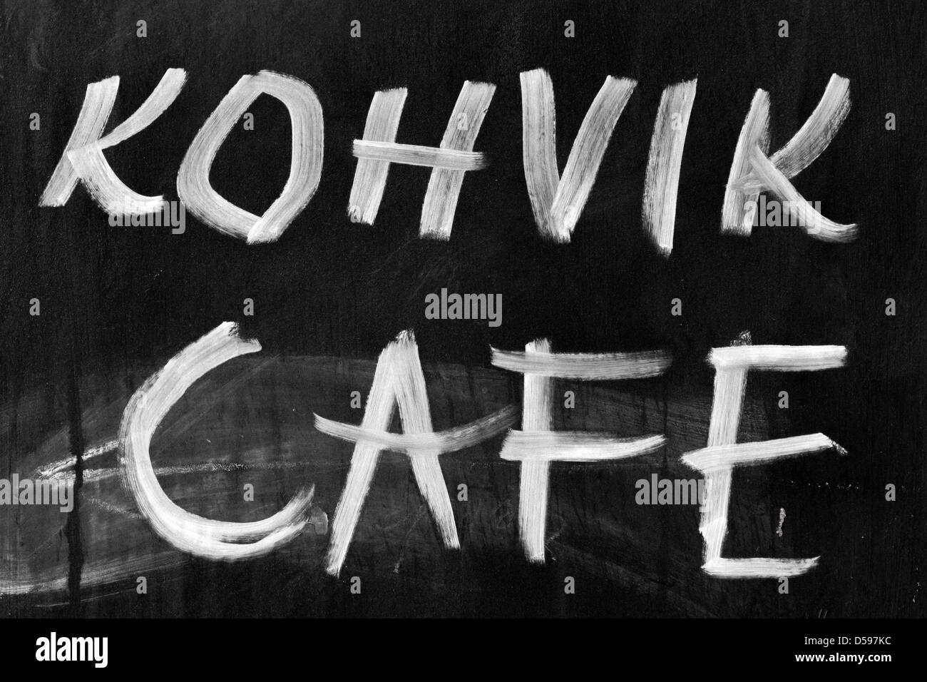 Advertising chalkboard of street cafe with text label on English and Estonian Stock Photo