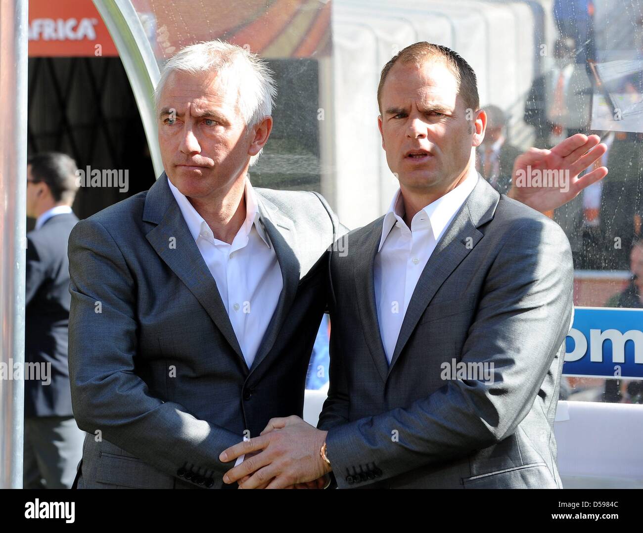 Dutch Coach Bert Van Marwijk L And Assistant Coach Frank De Boer On The Bench During The 2010 Fifa World Cup Group E Match Between The Netherlands And Denmark At Soccer City