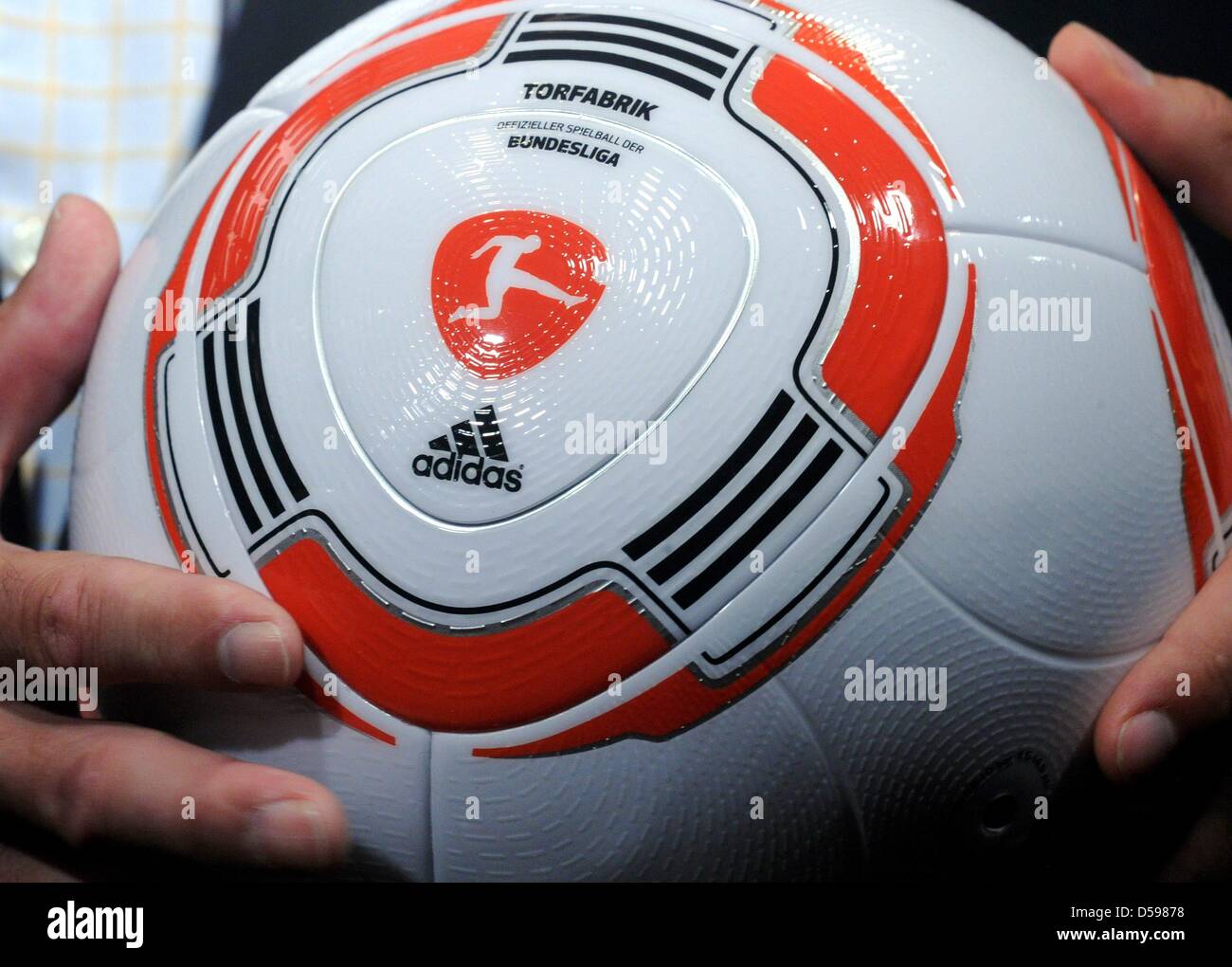 The new ball of the German Bundesliga is shown during a press conference of the German team in Velmore Grand Hotel in Erasmia near Pretoria, 15 June 2010. The ball is named "Torfabrik". Photo: Marcus Brandt dpa  +++(c) dpa - Bildfunk+++ Stock Photo