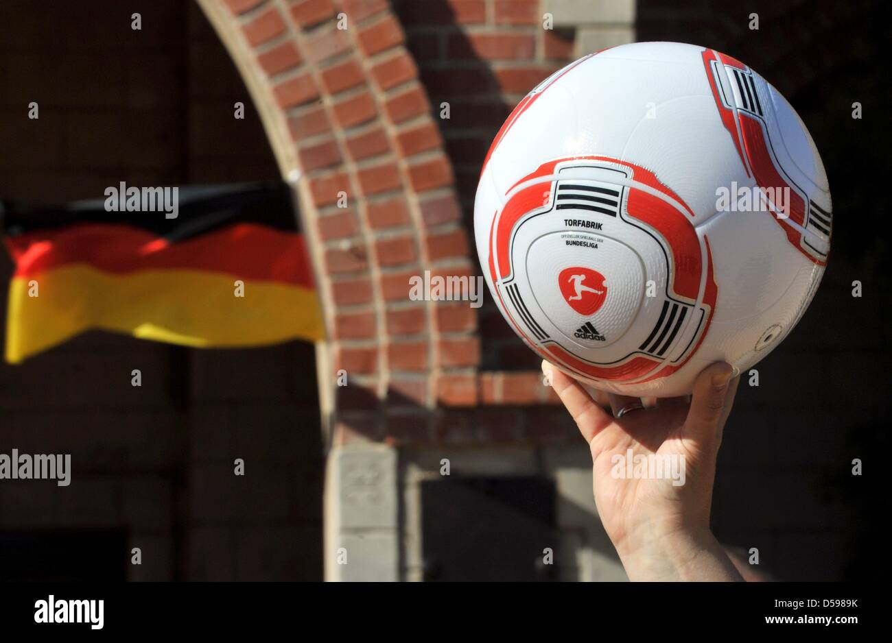 The new ball of the German Bundesliga is shown during a press conference of the German team in Velmore Grand Hotel in Erasmia near Pretoria, 15 June 2010. The ball is named Torfabrik. Foto: Bernd Weißbrod dpa  +++(c) dpa - Bildfunk+++ Stock Photo
