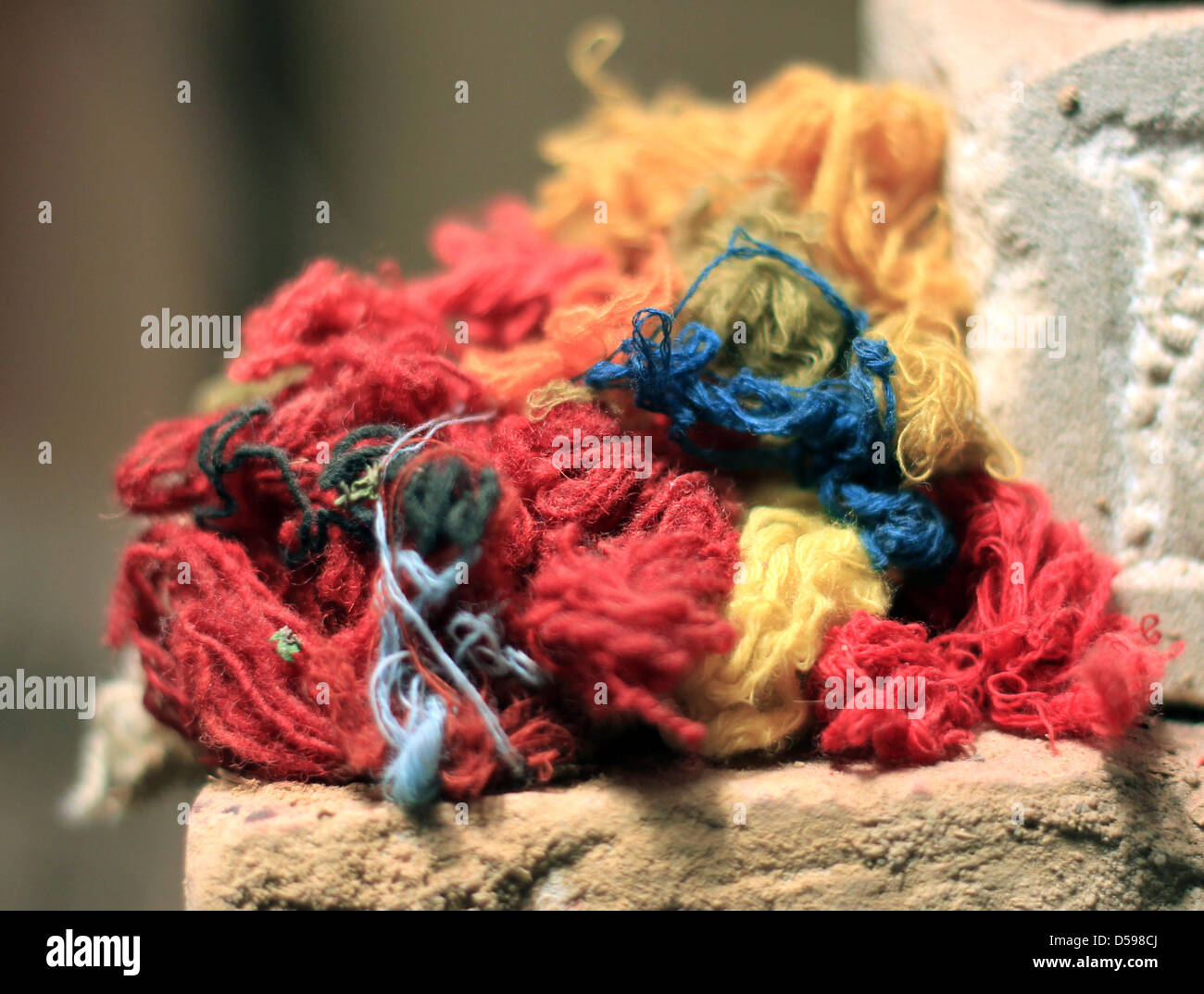 Naturally died scarves of various material and colours are sold at the ...